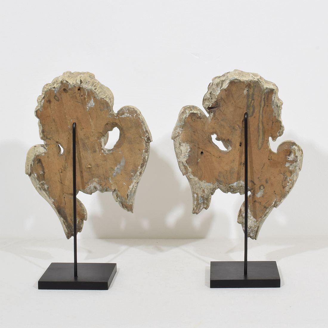 Hand-Carved Pair Italian, 17th / 18th Century Carved Wooden Winged Angel Head Ornaments