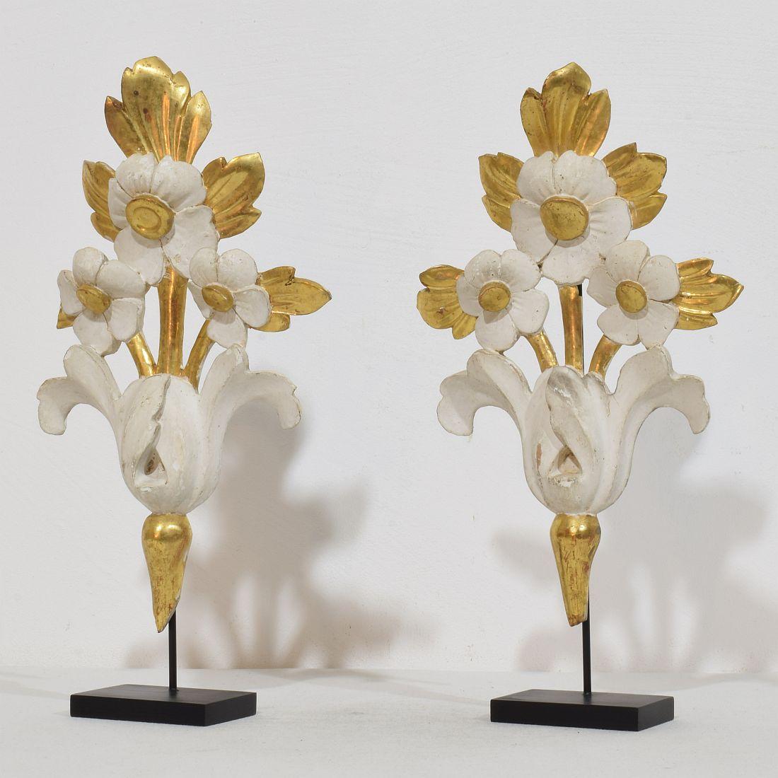
Beautiful handcarved giltwood ornaments that once adorned a chapel .Original period pieces that due their high age have a beautiful weathered look.
Italy circa 1780/1850 , weathered,small losses and old repairs.
Measurements are individual and