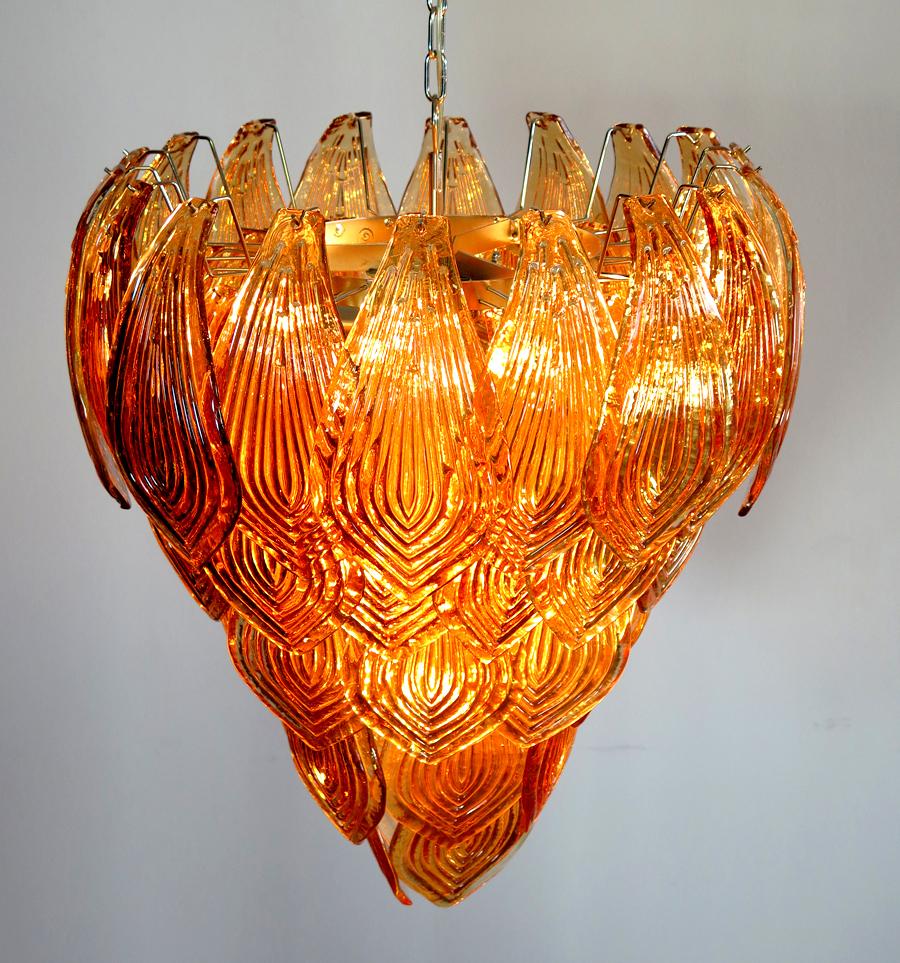 Beautiful and huge IPair talian Murano chandelier composed of 52 splendid amber glasses that give a very elegant look. The glasses of this chandelier are real works of art, the weight of this chandelier is 50 kg.
Period: late 20th