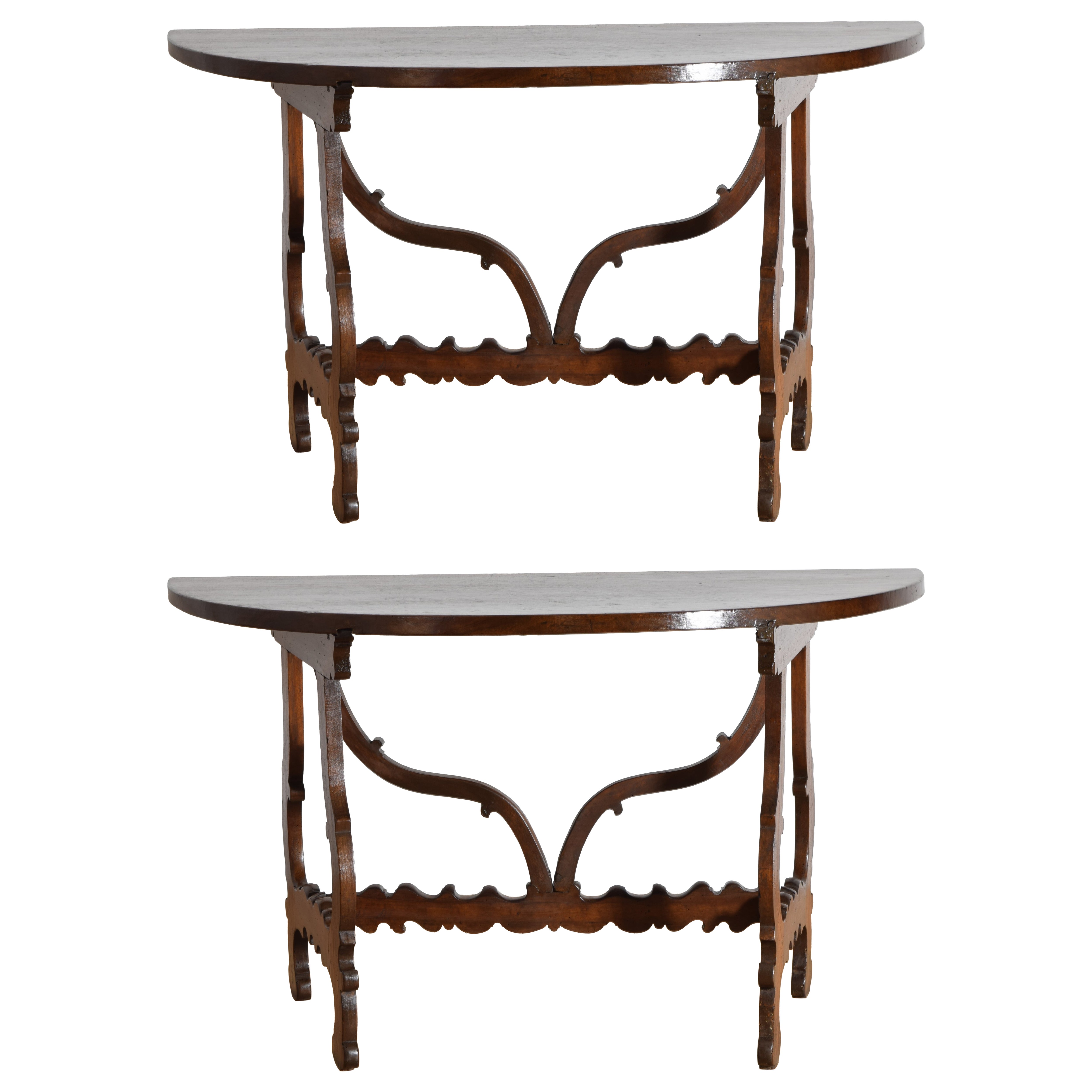 Pair Italian Baroque Walnut Demilune Console Tables, early 18th century