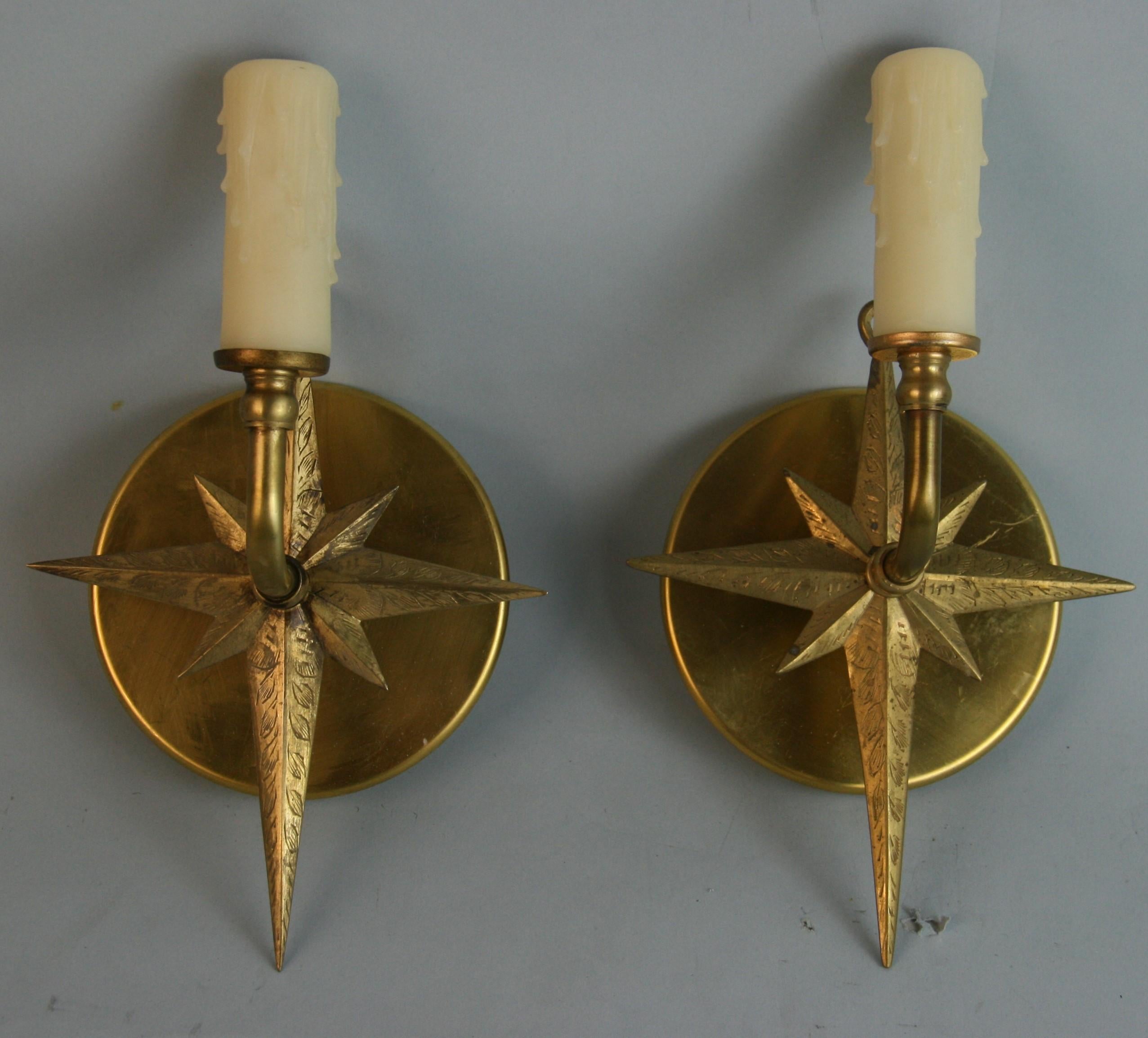 1396 Pair Italian brass star sconces.