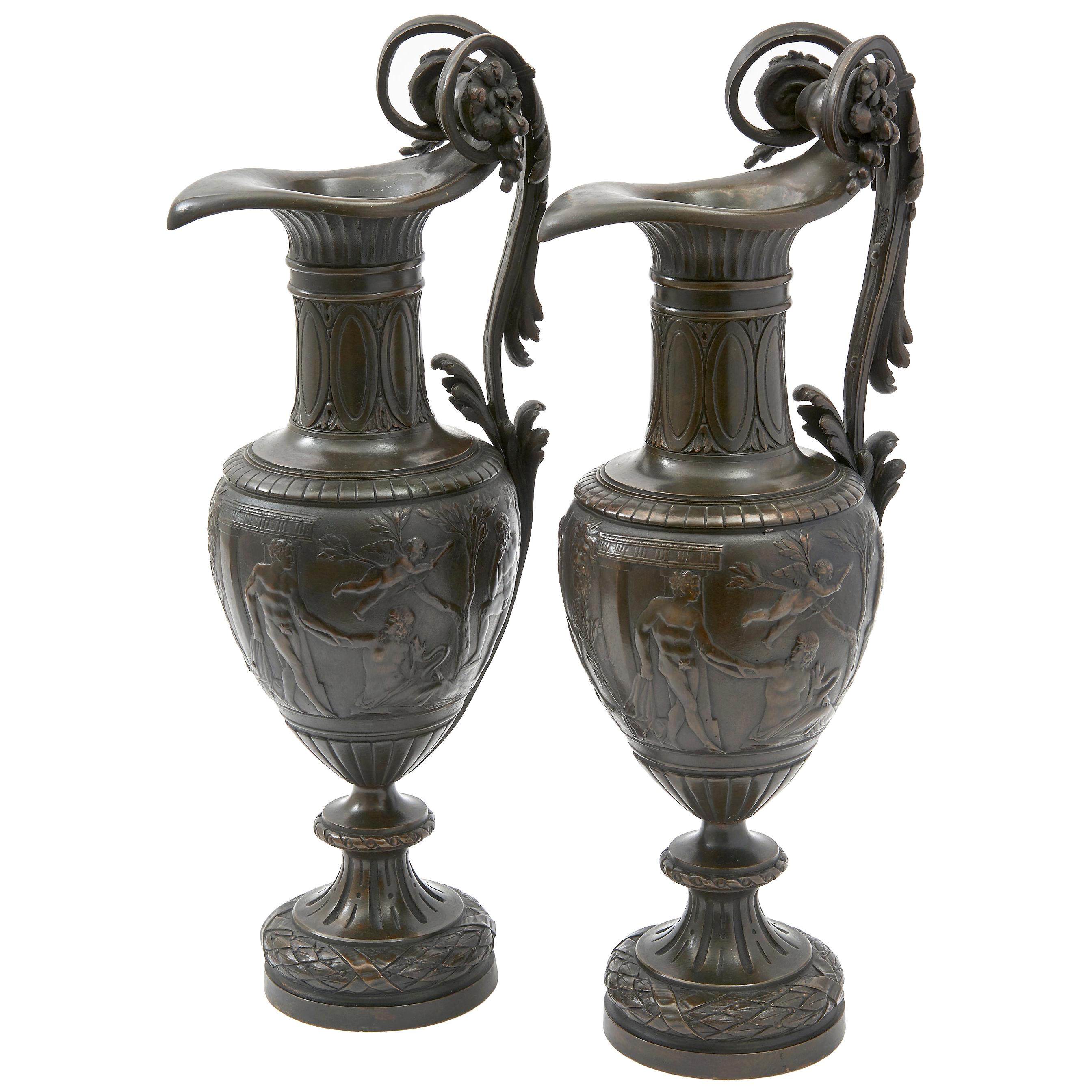 Pair of Italian Bronze Ewers with Scenes of Classical Antiquity, circa 1870 For Sale