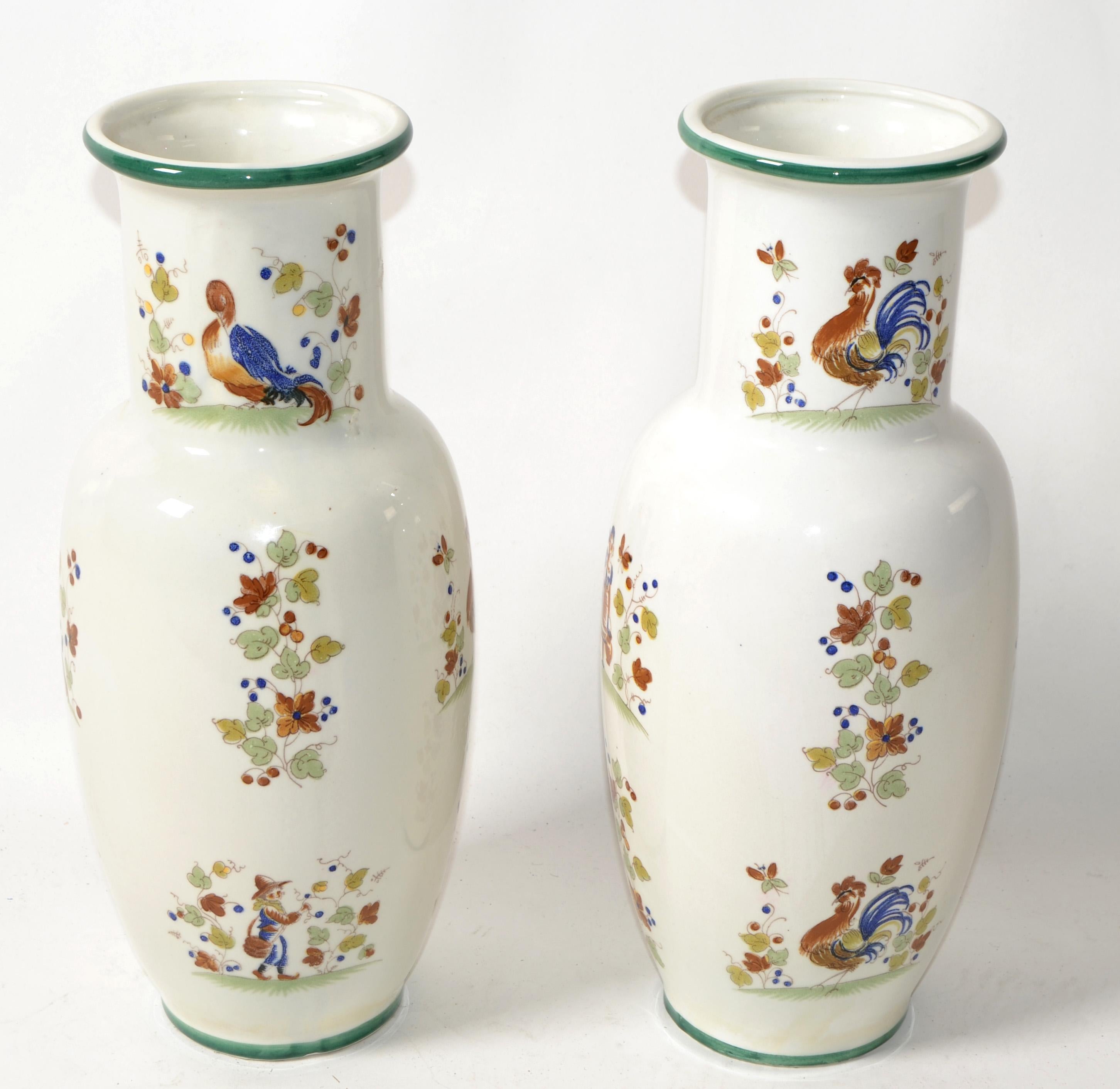 Charming Pair of Vintage Floral Vases in the Style of Deruta, hand-painted in Green, Beige and Blue Colors.
Depicting Leaves, Woman and Man as well as Birds all around. Hand-crafted and made out of glazed Ceramic.
Marked at the Base with gold foil