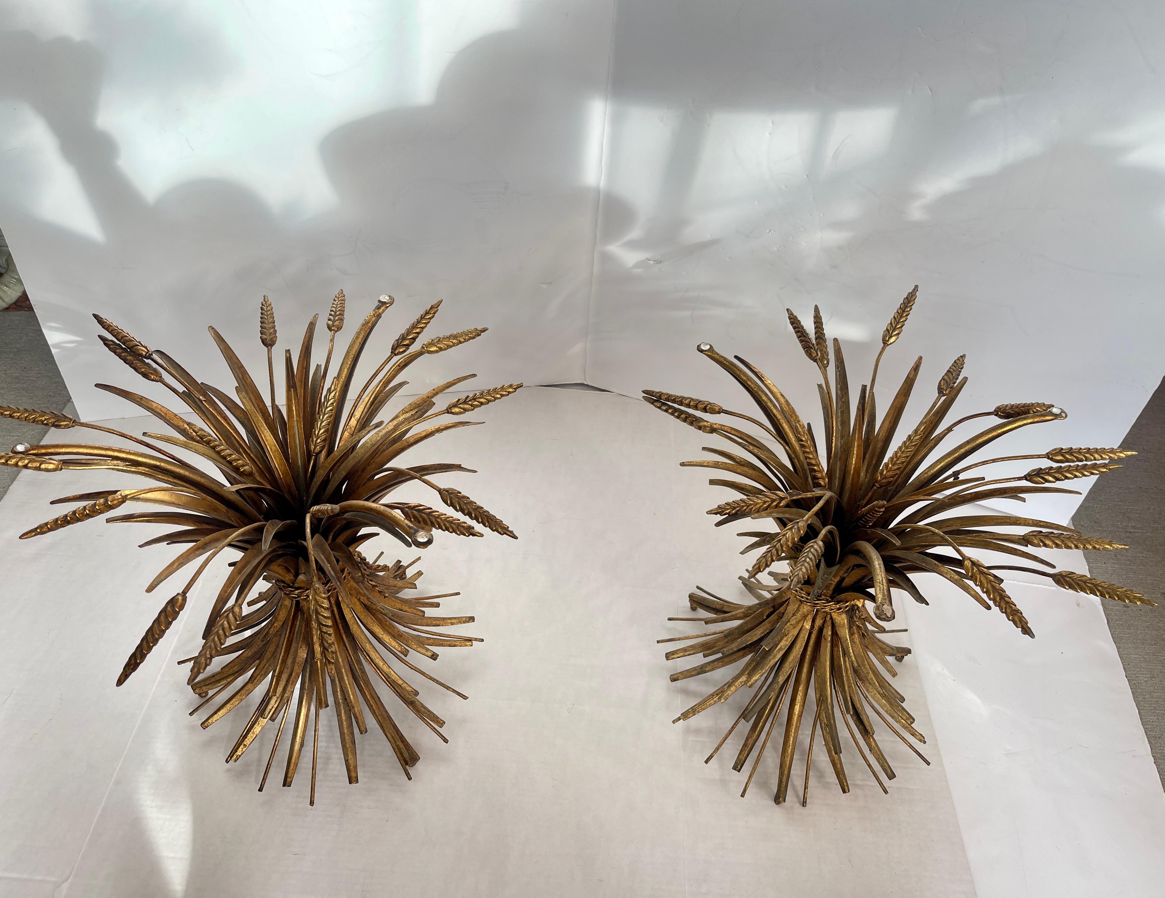 Just in, this wonderful Pair of Italian Coco Sheaf Of Wheat Gilt Side Tables, 1960s.
They are often called the Coco Table in reference Madame Coco Chanel as she had a pair of these in her apartment on the Rue Cambon in Paris.
They are gilt metal and