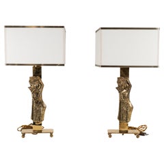 Pair Italian design brass table lamps with solid figure decor