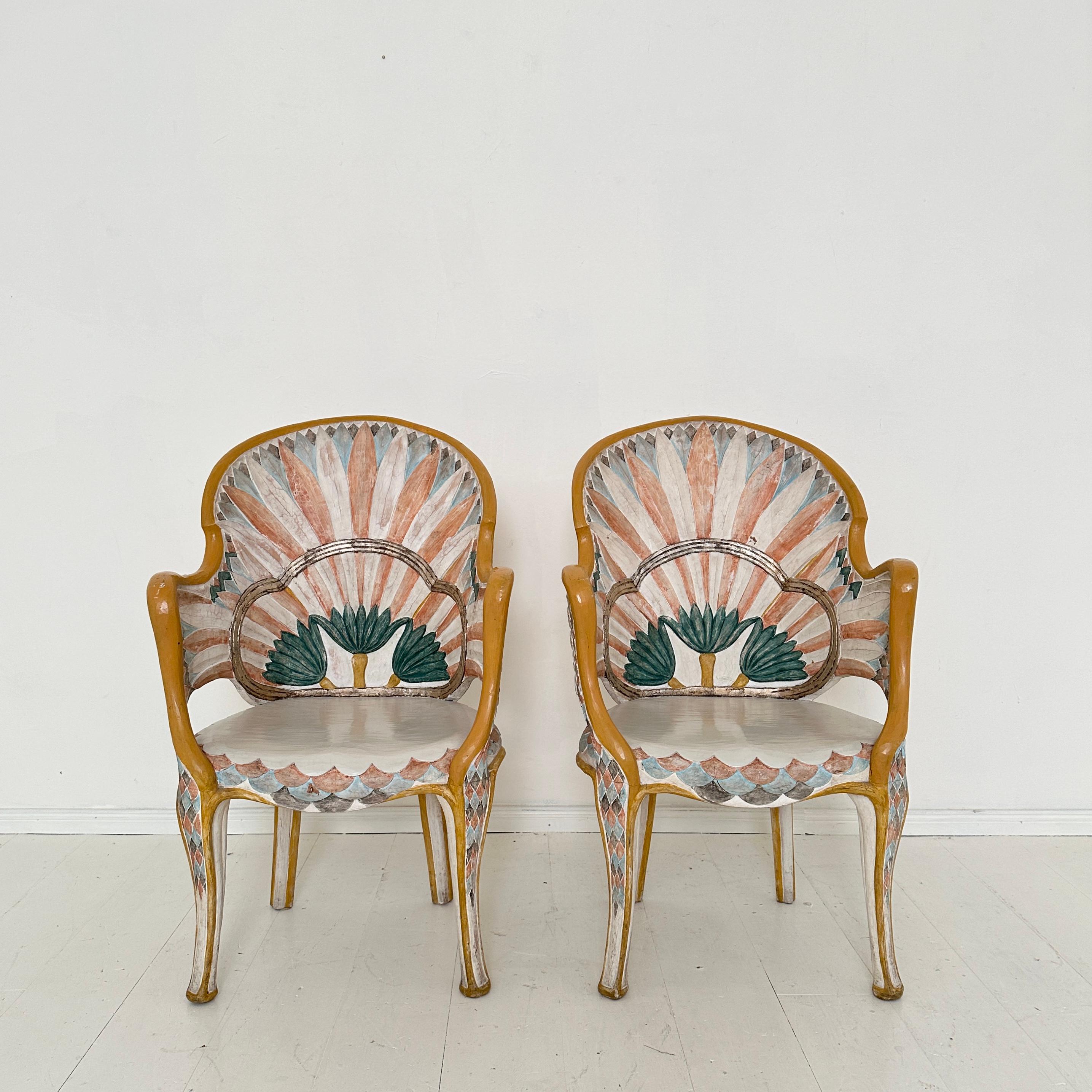 These exquisite Italian dining chairs, crafted in the 1970s by the renowned Florence maker Bartolozzi and Maioli, showcase a stunning blend of elegance and artistry. Inspired by the Egyptian Revival style, each chair features intricate hand-carved