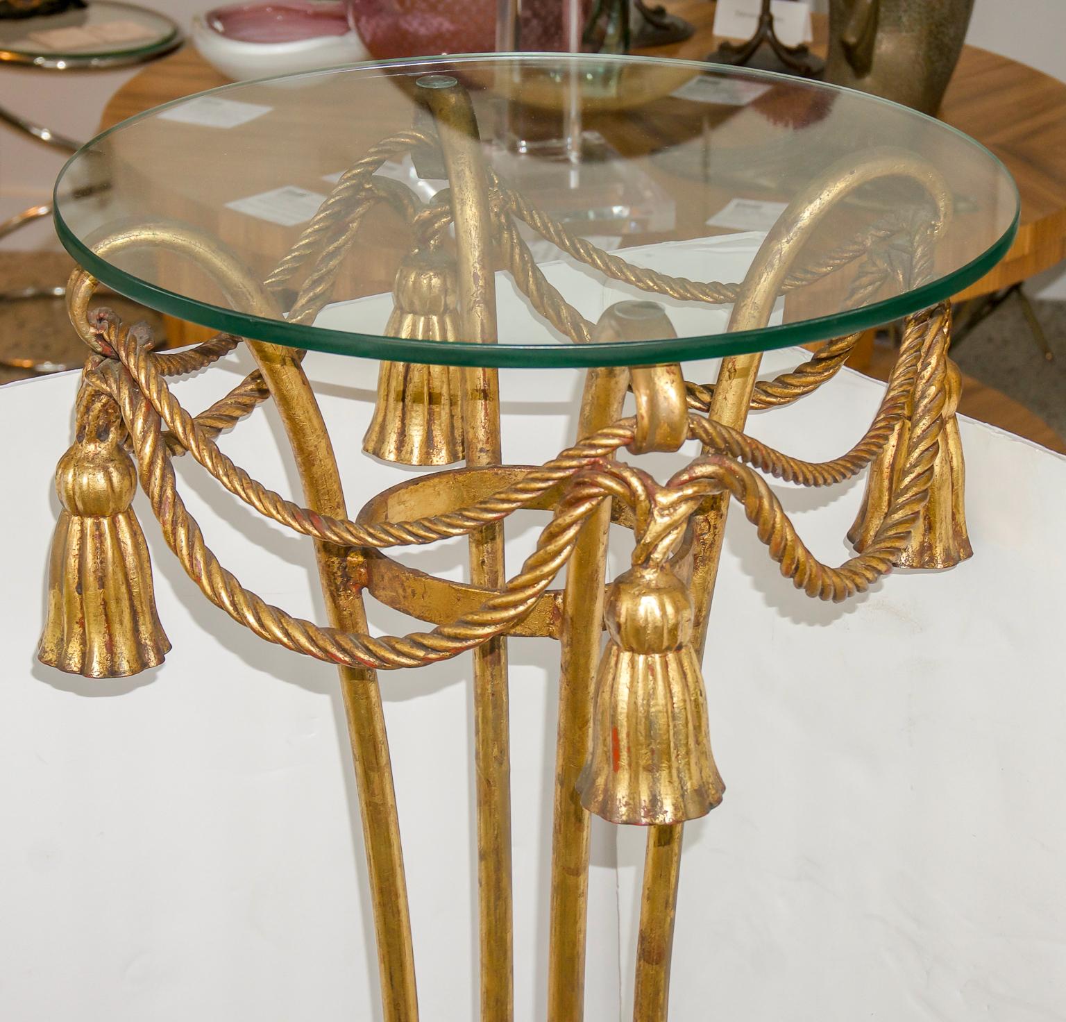 Pair of decorative midcentury Italian gilt metal rope and tassel plant stand.