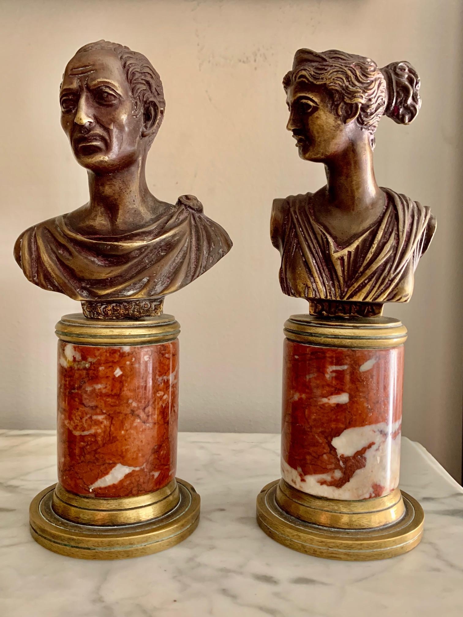 A classical pair of bronze bust, with rouge marble colum and gilt bronce base.