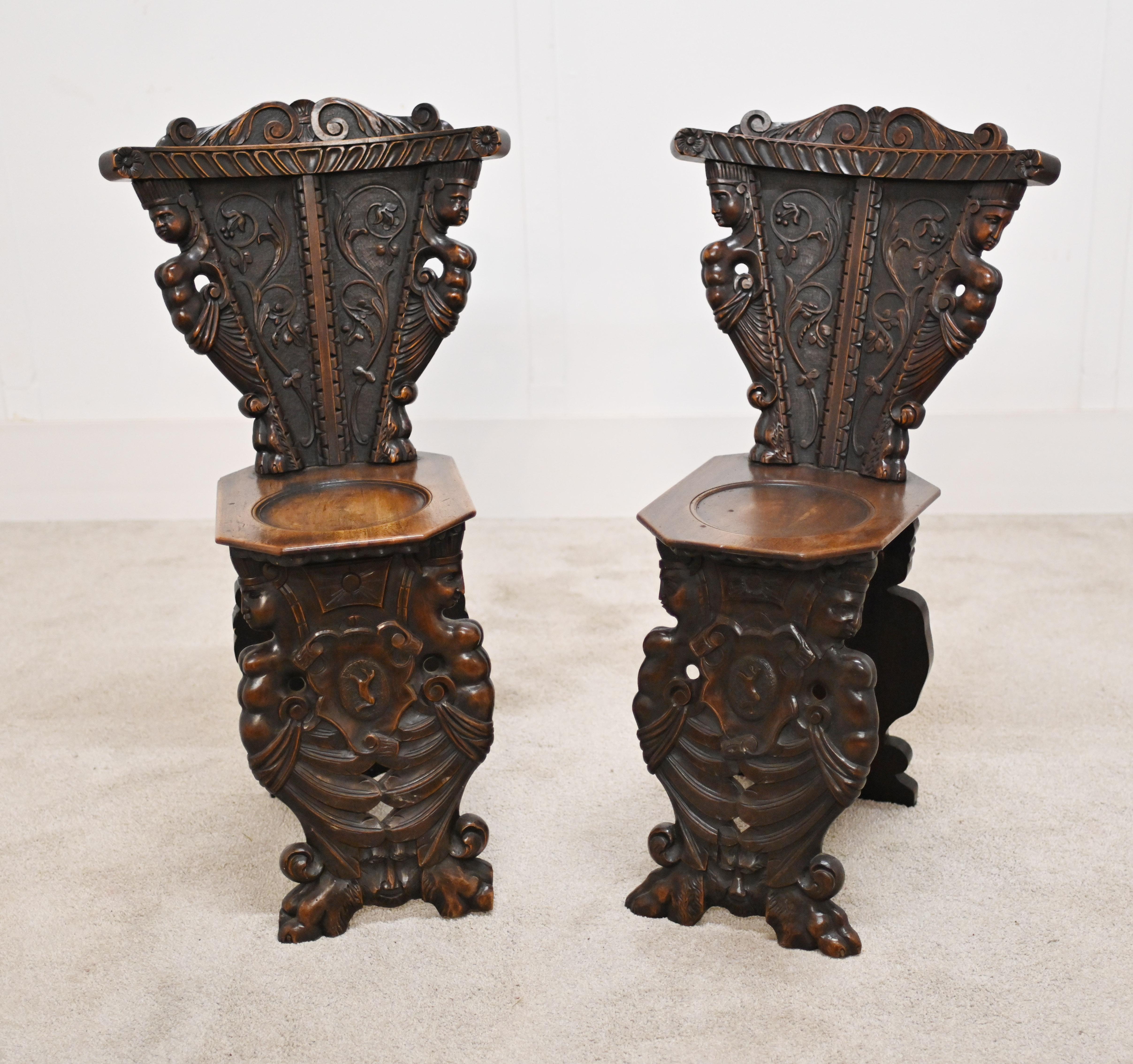 Wonderful pair of antique Italian hall chairs
Circa 1880
Very collectable pair would look great as accents decorated with a cushion
The carving is superb and detailed including scrolls, semi nude maidens and rosettes
Offered in great condition ready
