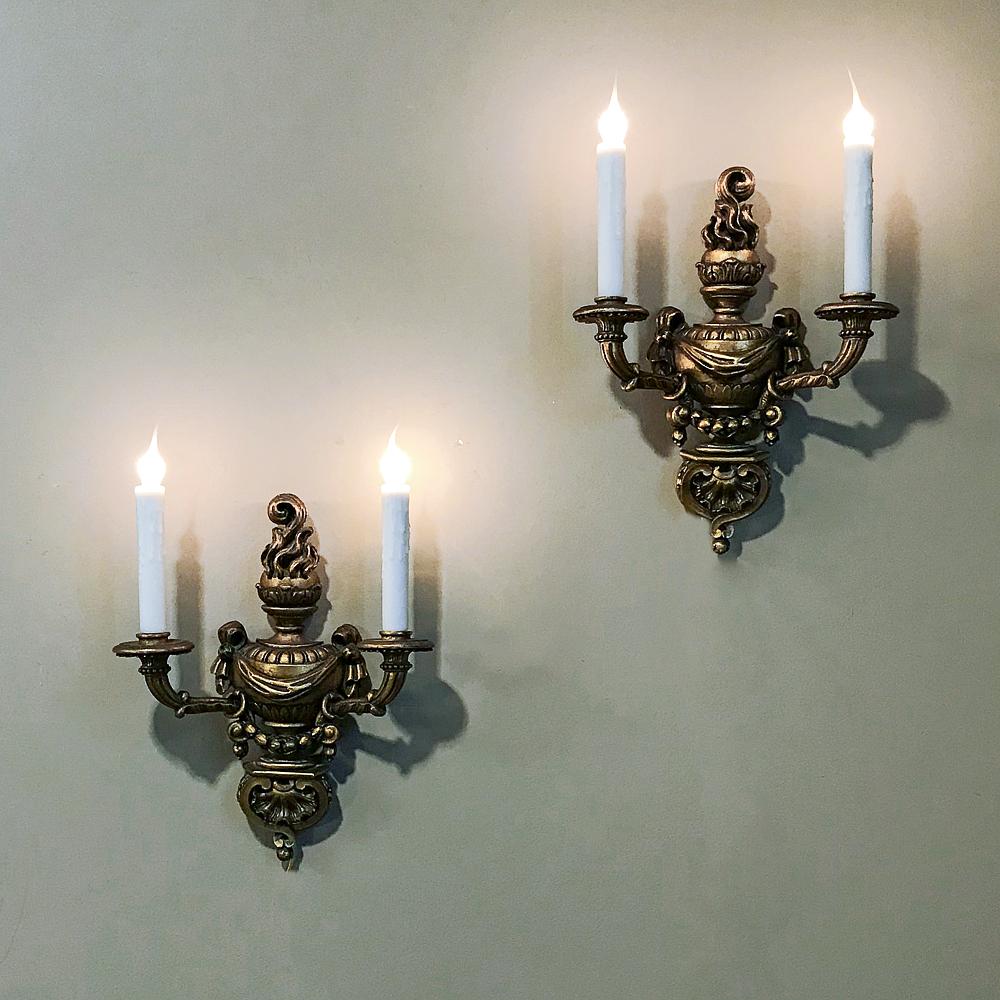 Pair of Italian hand carved Louis XVI giltwood sconces were sculpted and hand painted to perfection, then highlighted in gold for a touch of opulence.
Newly electrified, included in the price,
circa early 1900s
Each measures 16 H x 13.5 W x 6 D.