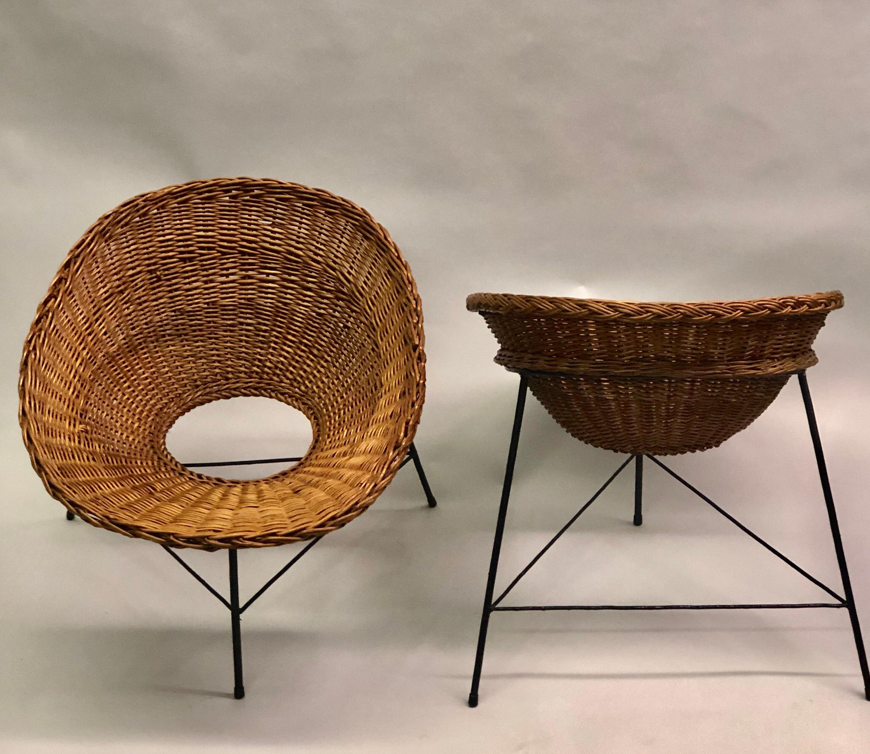 Elegant, stunning pair of Italian Mid-Century Modern cantilevered armchairs / lounge chairs attributed to Augusto Bozzi.  The pieces embody both Modernism and Craft. They are handmade and have an open and transparent aesthetic. The chairs have hand