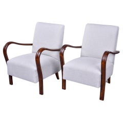 Pair Italian Mid-Century Modern Chairs with Curvy Channeled Arms