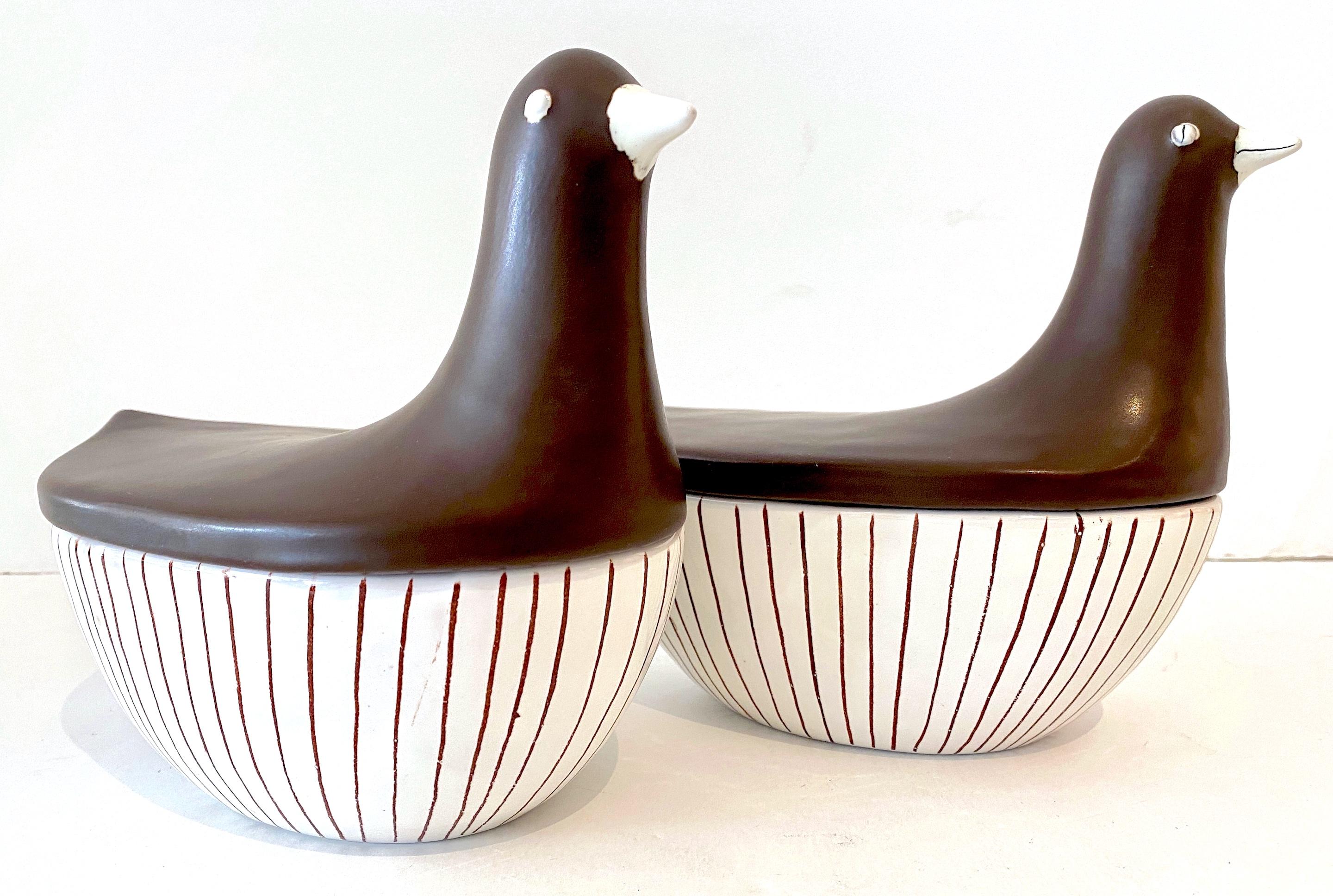 Pair Italian midcentury Porcelain Figural Dove Boxes, circa 1960s
Italy, circa 1960s

This pair of Italian midcentury porcelain figural dove boxes from the 1960s is a delightful and expressive example of Italian ceramic artistry. The oval-shaped