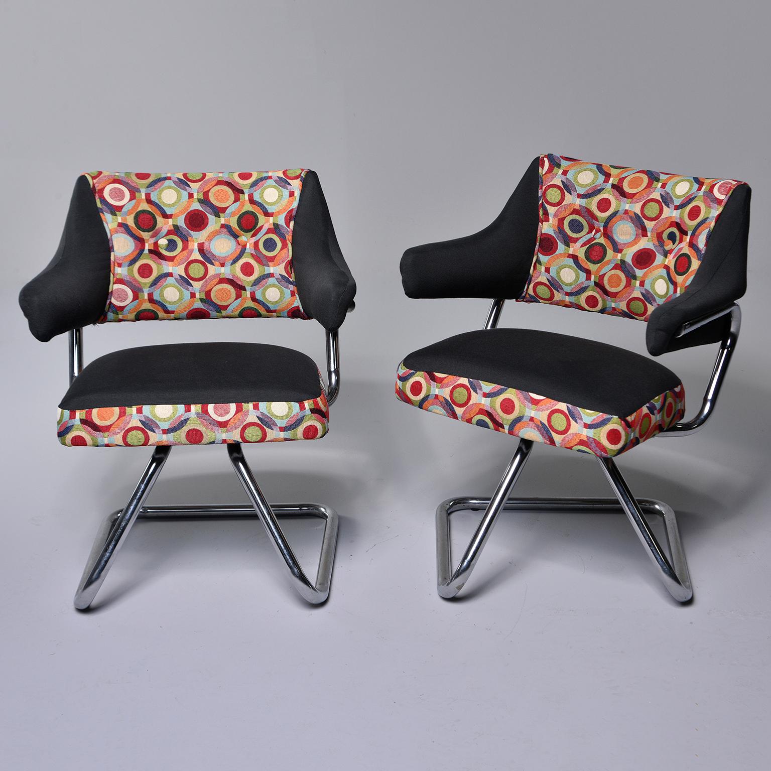 Pair circa 1960s Italian arm chairs feature a cantilever chrome base with swivel seats and new upholstery with colorful, Missoni-style fabric. Sold and priced as a pair. 

Arm Height:  24.5”  Seat Height:  18.25”
Seat Depth:  17.75”  Seat Width:  18”