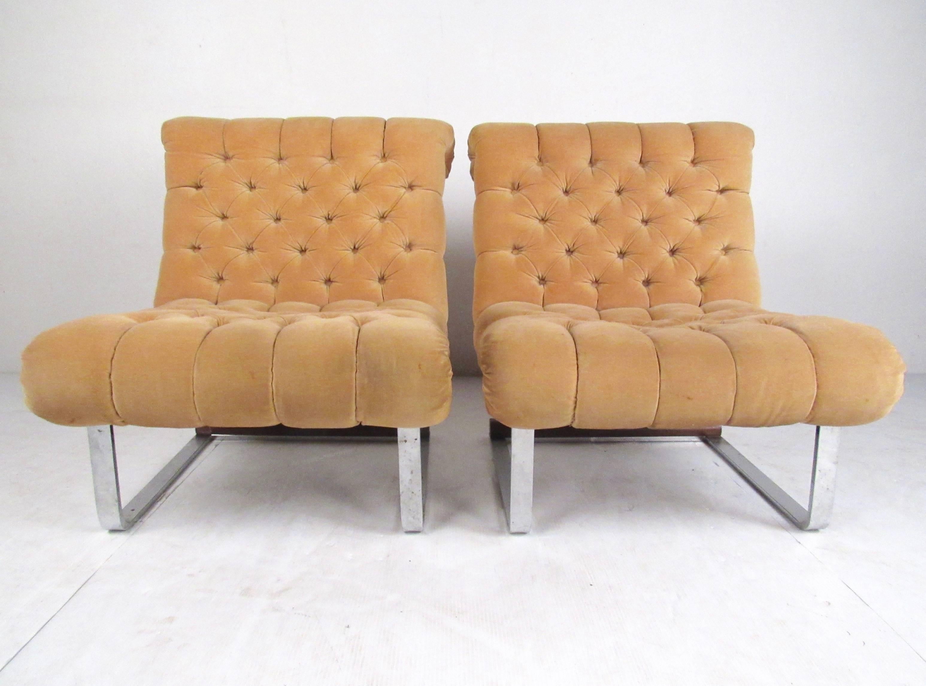 This pair of Mid-Century Modern lounge chairs features heavy chrome cantilever base, tufted vintage fabric, and unique Italian modern design. Sculpted seats make an elegant vintage modern addition to home or business seating, while the