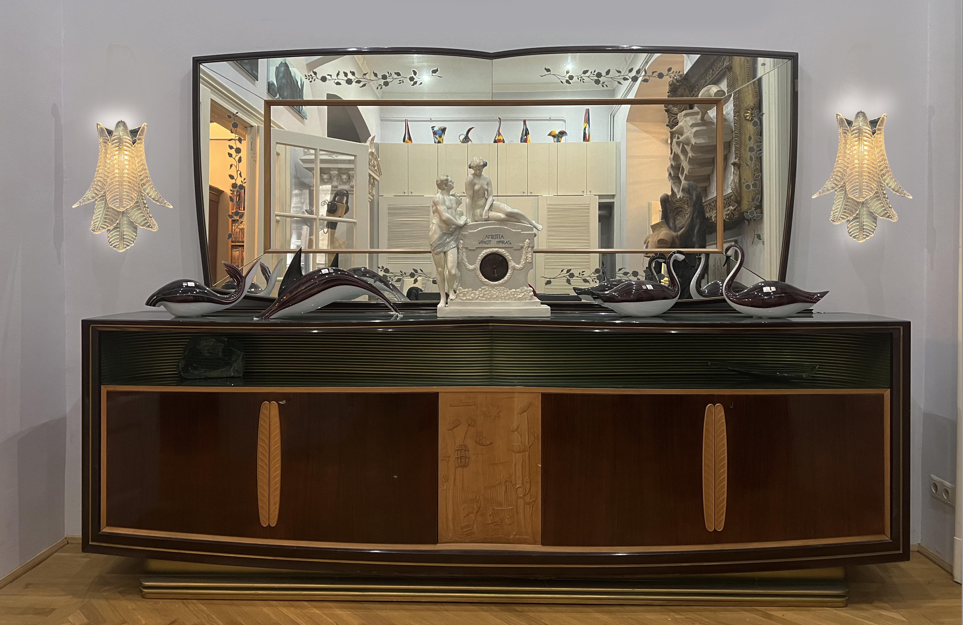 Fantastic pair of vintage Murano wall sconce made by 6 Murano trasparent Six-Tier Felci for each applique in a chrome metal frame.
Period:late xx century
Dimensions: 18,50 inches height (47 cm); 14,60 inches width (37 cm); 9 inches depth from the
