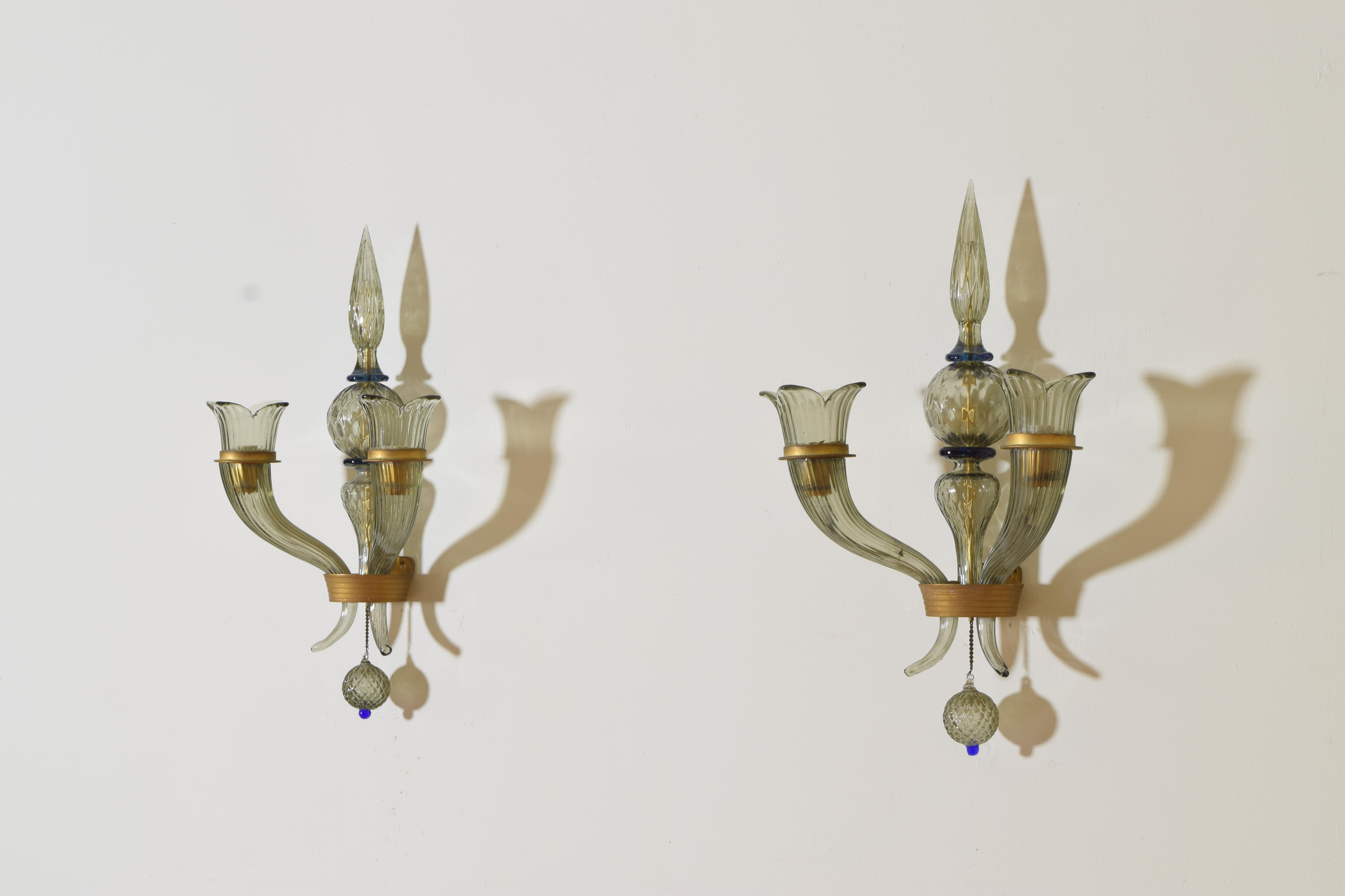 Pair of mid century Murano glass wall sconces with brass structure and Murano glass
Produced by Barovier & Toso, Italy, ca. 1950, price includes electrification.