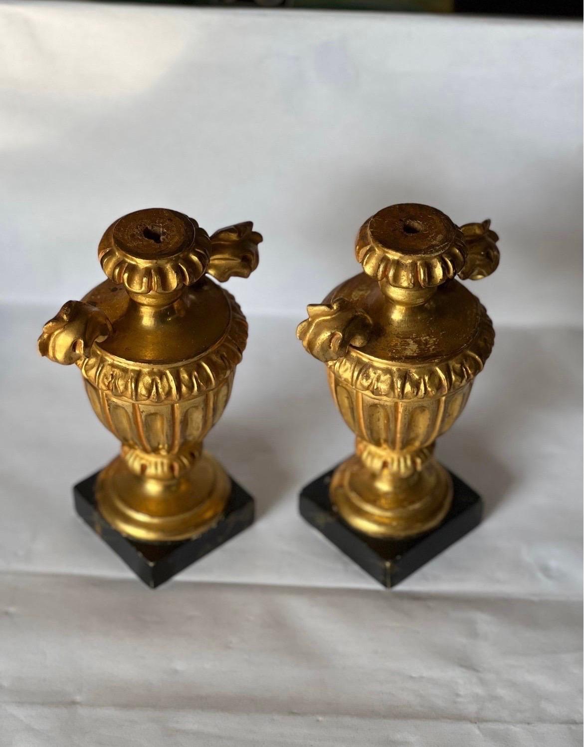 Giltwood Pair Italian Neoclassical Carved Gilt Wood Ornamental Urns on Faux Marble Bases For Sale
