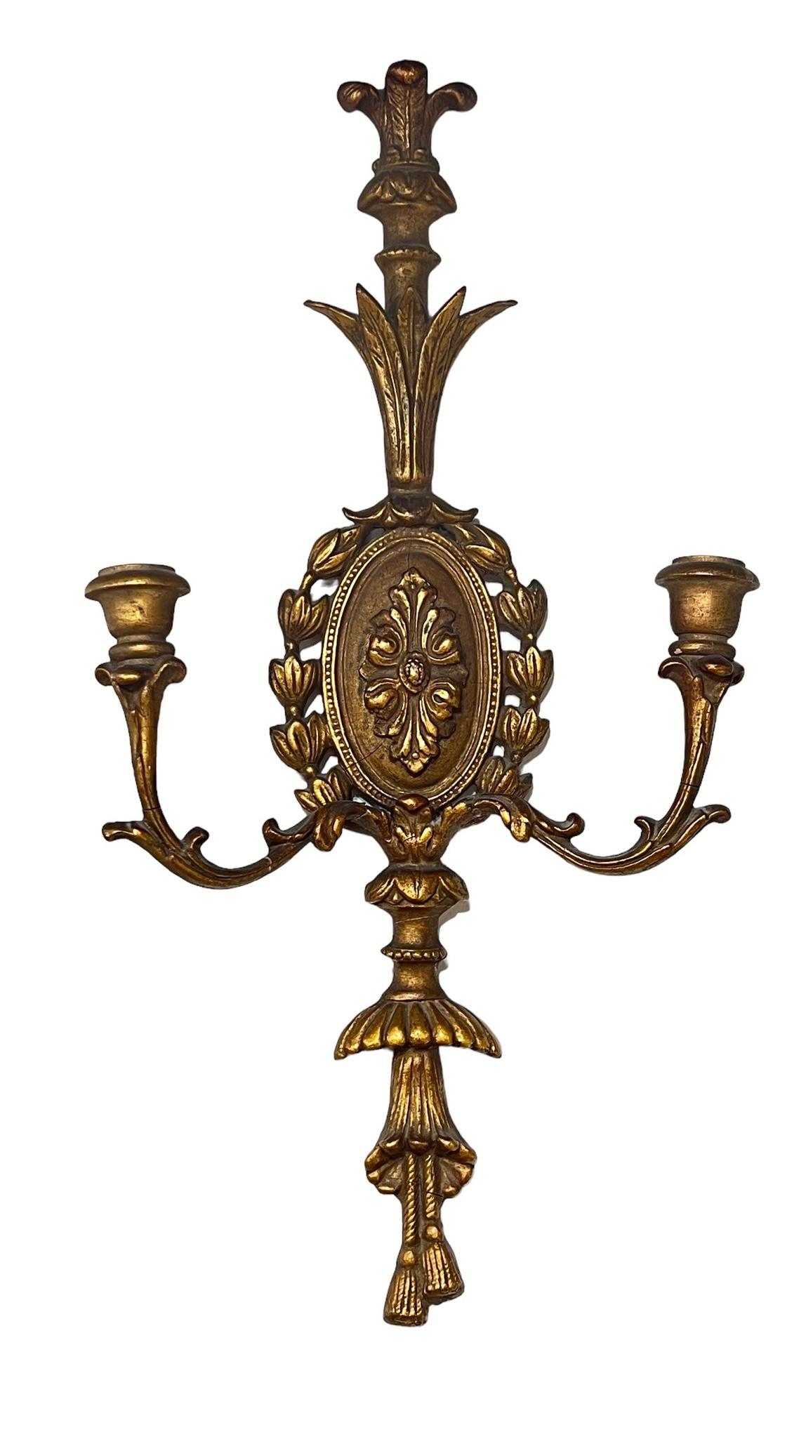 Pair of antique Italian carved giltwood wall lights in the neoclassicals style.