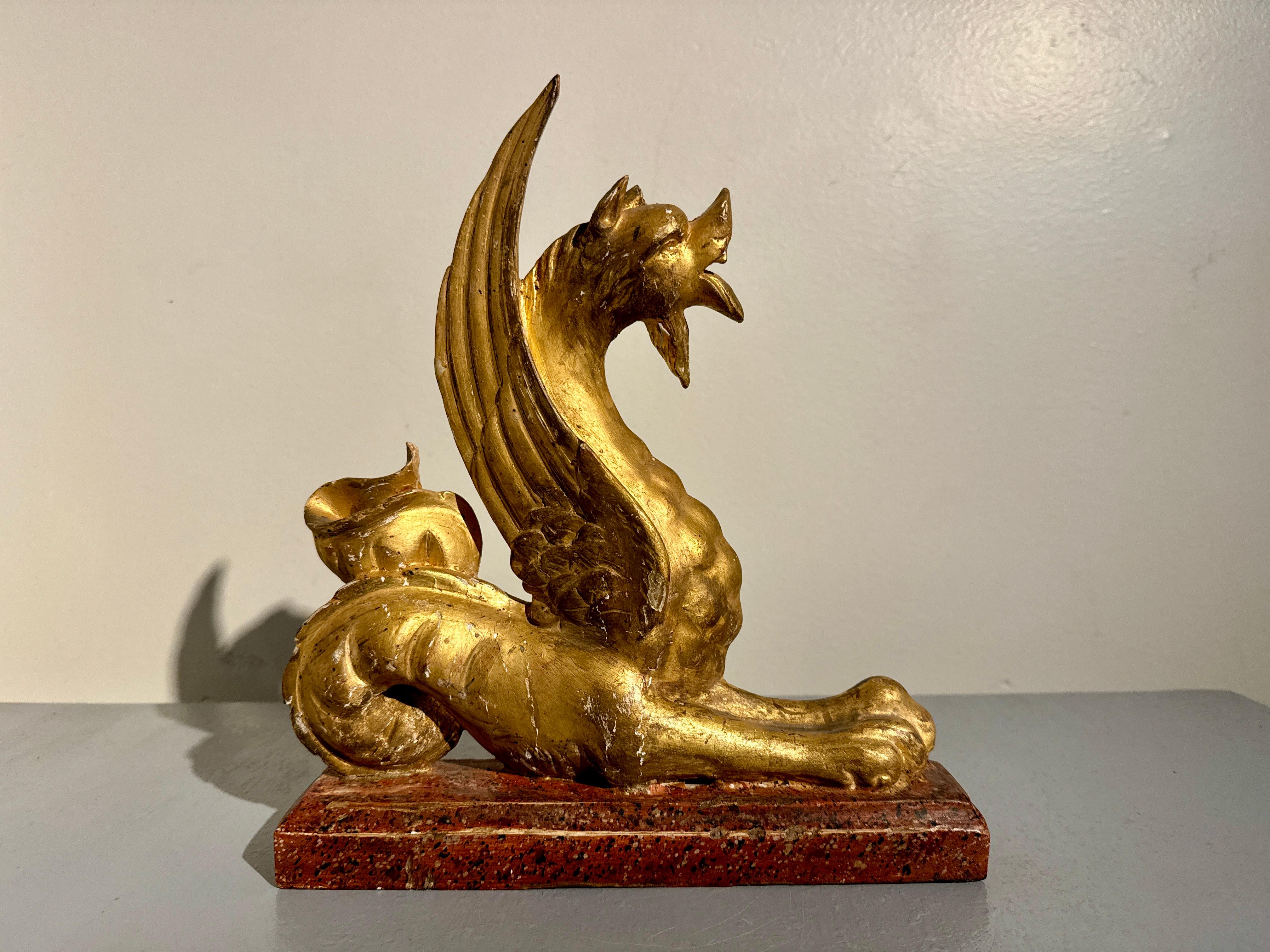 Gesso Pair Italian Neoclassical Craved and Gilt Wood Mythical Beasts, mid 19th century For Sale