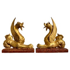 Pair Italian Neoclassical Craved and Gilt Wood Mythical Beasts, mid 19th century