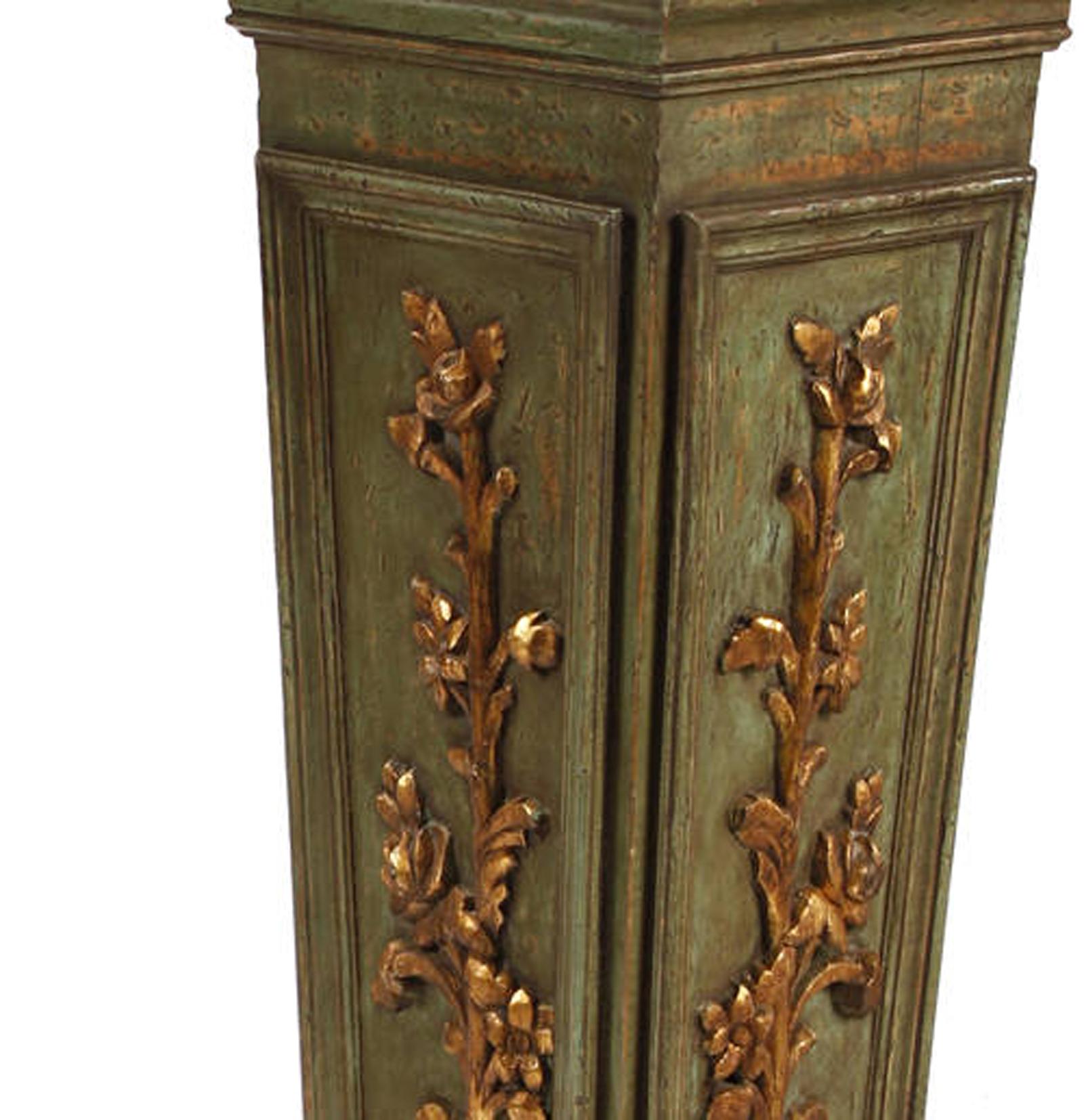Beautiful pair of Italian neoclassical style parcel gilt and green decorated wood square pedestals in a parcel gilt foliage motif. Second half of the 20th century.
