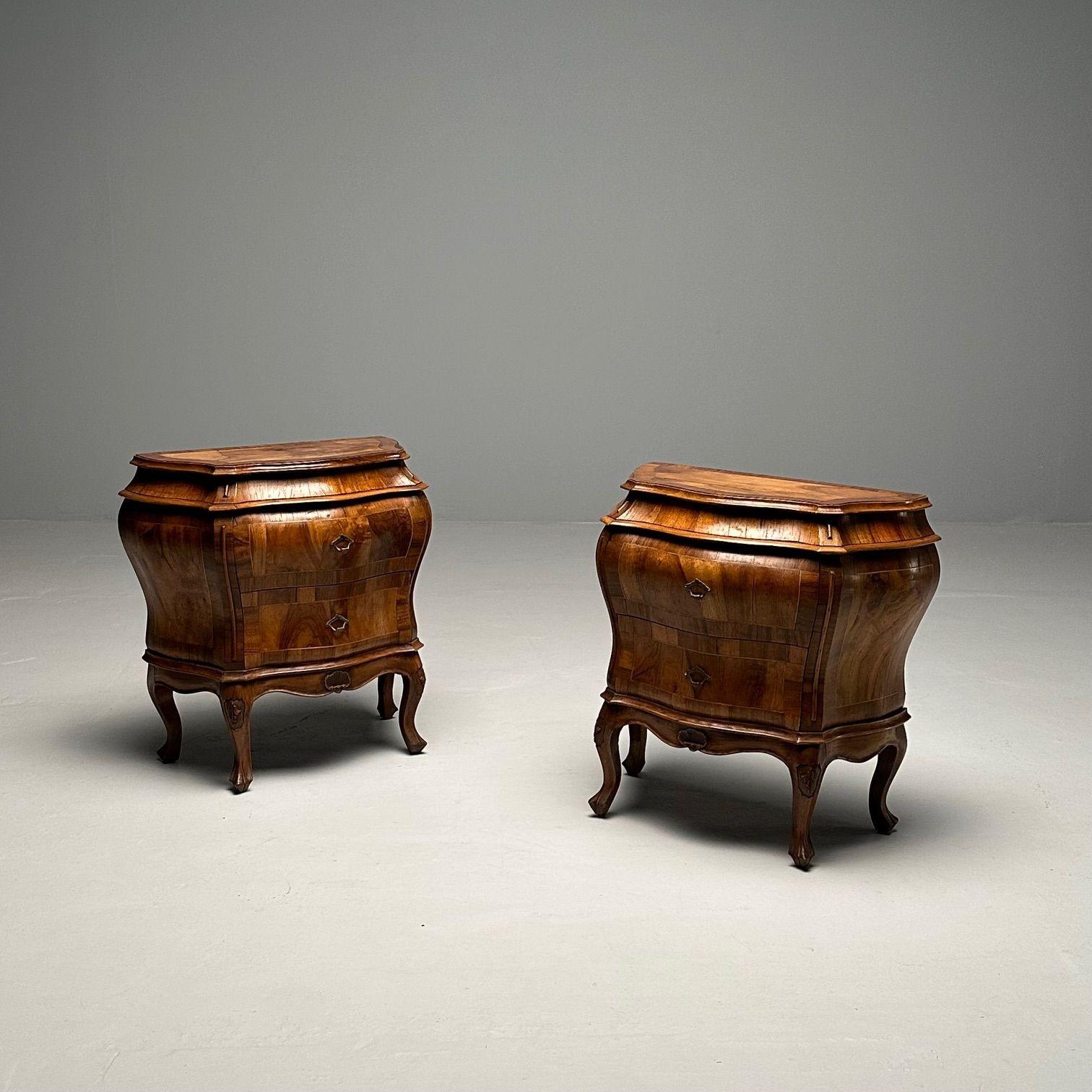 Pair of Italian Olive Wood Commodes, Nightstands, End Tables or Pedestals, Baroque Style

Each having two drawers of bombe form. Labeled ITALY. Both having minor veneer issues consistent with pricing.

Height: 26.25 Width: 26 Depth: 12.25