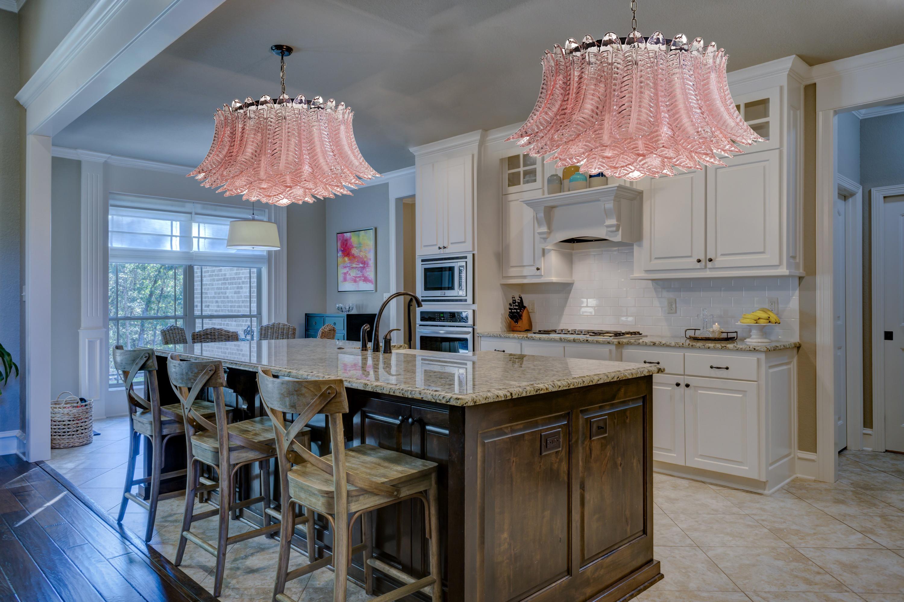 Pair Italian vintage ceiling chandeliers in Murano glass and nickel plated metal structure. The armor polished nickel supports 100 large pink glass leaves felci plus a glass sphere used as a pink finish. Can be used as a chandelier with chain, or as