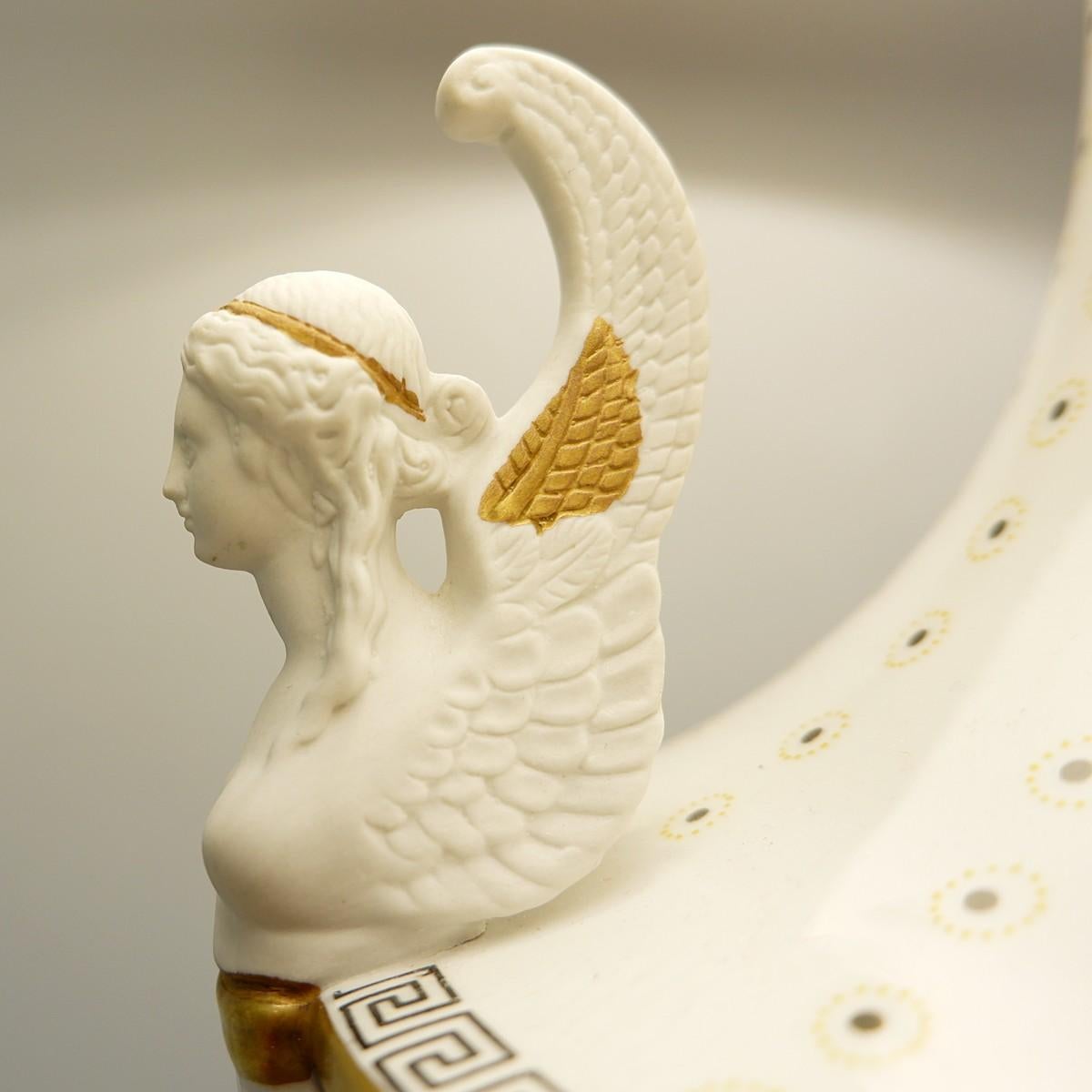 Pair of Italian porcelain table lamps by Giulia Mangani, of neoclassical urn form.