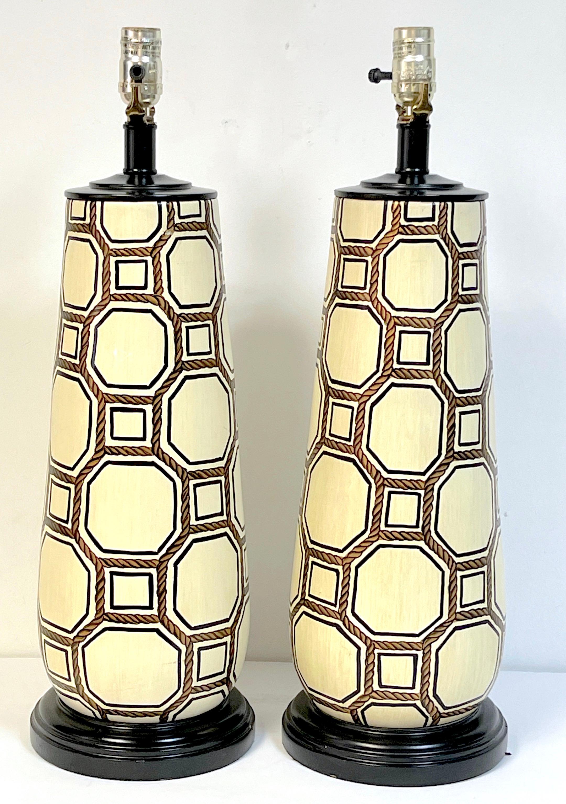 Pair Italian Pottery Geometric Rope Vignette Lamps, Manner of Gio Ponti  
Italy, circa 1960s
A tall pair of sleek and subtle Italian Mid-Century pottery lamps, influenced by Gio Ponti designs. Each one of off white/cream 'Eggshell' pottery,