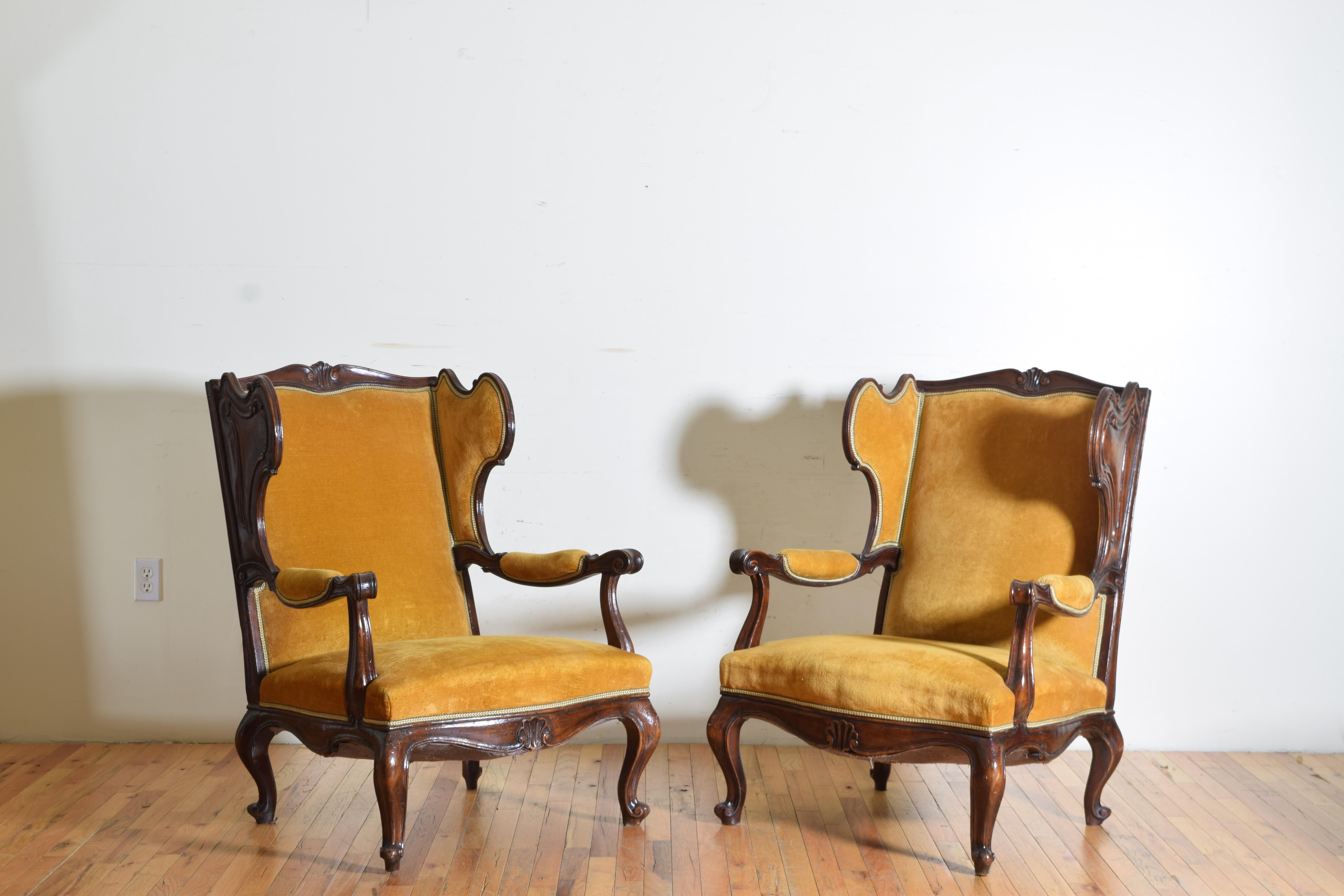 Mid-20th Century Pair of Italian Rococo Revival Style Walnut and Upholstered Wingchairs