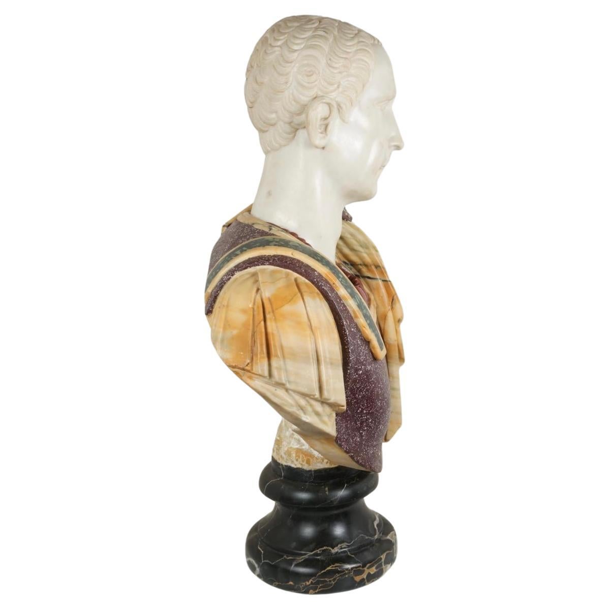 Large and Stunning Pair of 20th Century Italian Specimen Marble, Egyptian Porphyry, Verde Antico and Hardstone Busts of Roman Emperors. Each bust length figure classically draped in variegated yellow marble over breastplate of Egyptian porphyry and