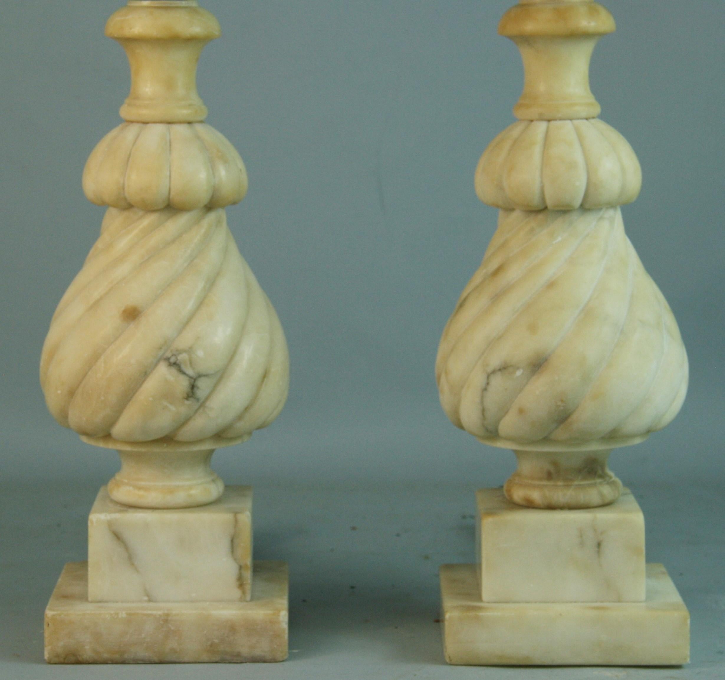 1510 Pair rare hand carved alabaster[  spiral lamps.
Dimension shown for alabaster only
Lamps will be rewired on demand