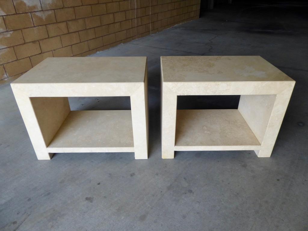 A pair of travertine 