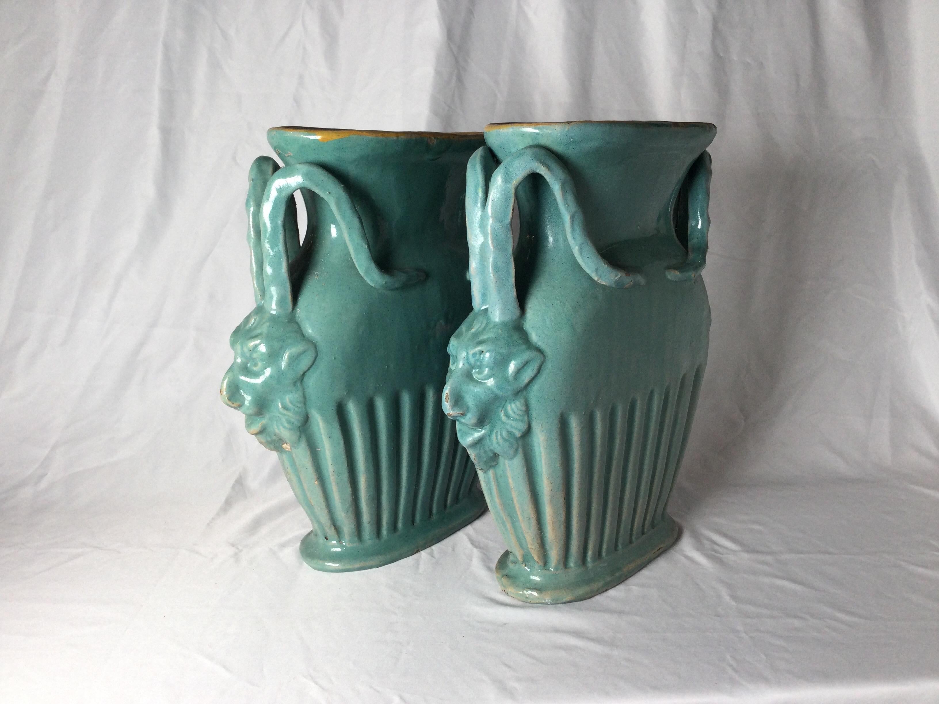 Pair of Italian turquoise pottery vases with mythical handles. Nice large size 13 1/4