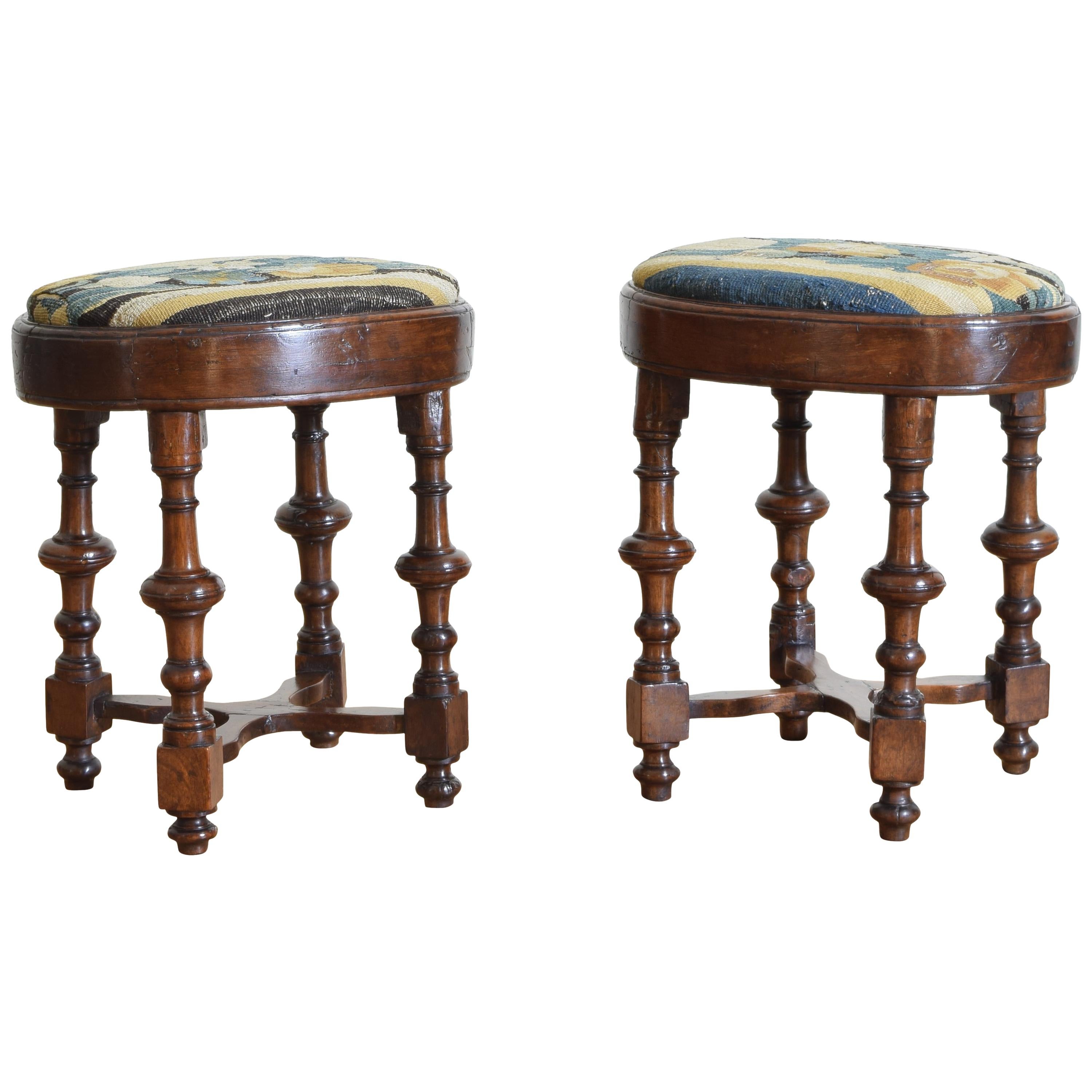 Pair of Italian Walnut and Tapestry Upholstered Footstools, Early 18th Century