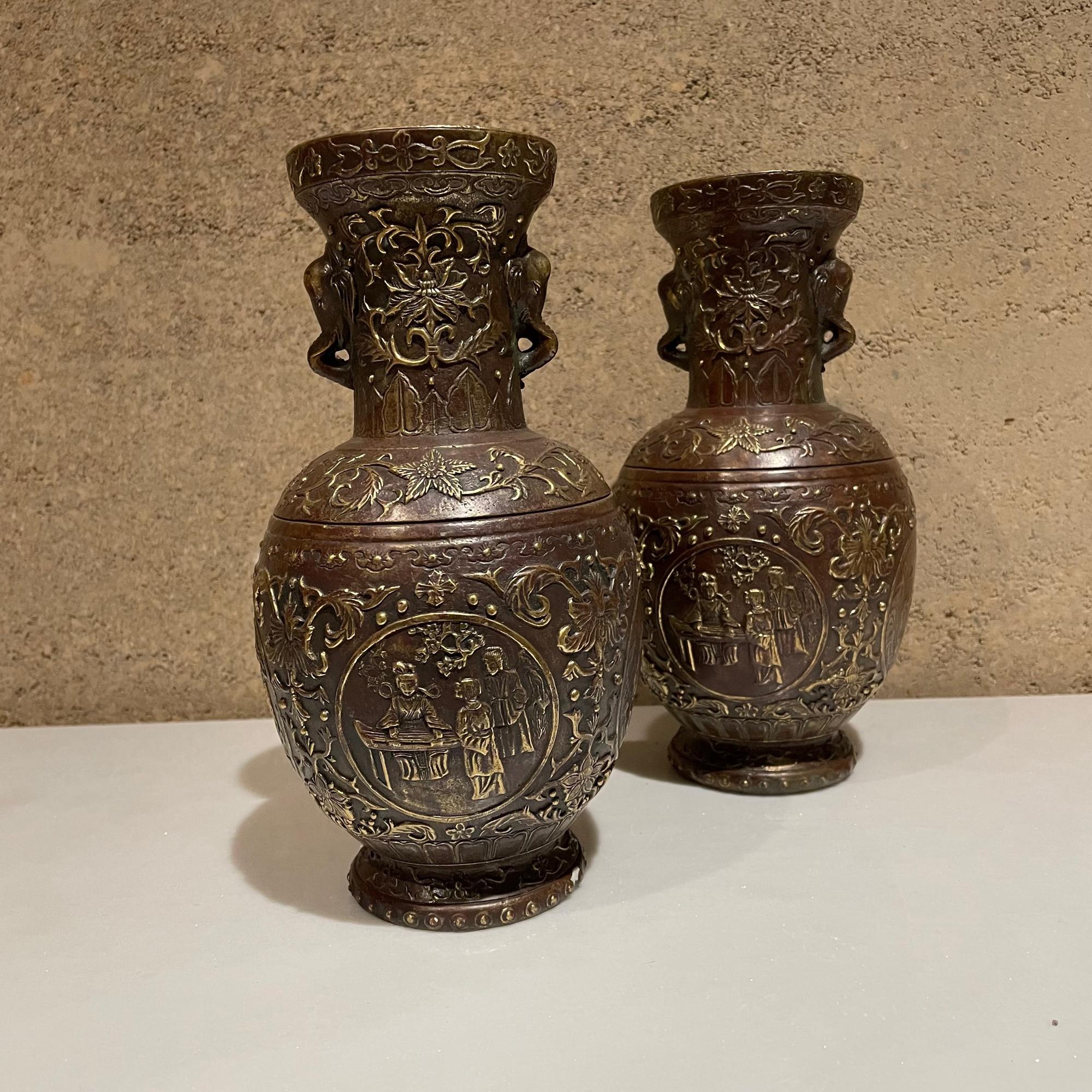 Vases
Pair of Japanese Urns Cloisonne Vases in Bronze, Meiji Era JAPAN
Figural panels and relief form decoration.
Stamped, signed signature underneath. No additional information is available.
Dimensions: 9H x 5 in diameter
Original Unrestored