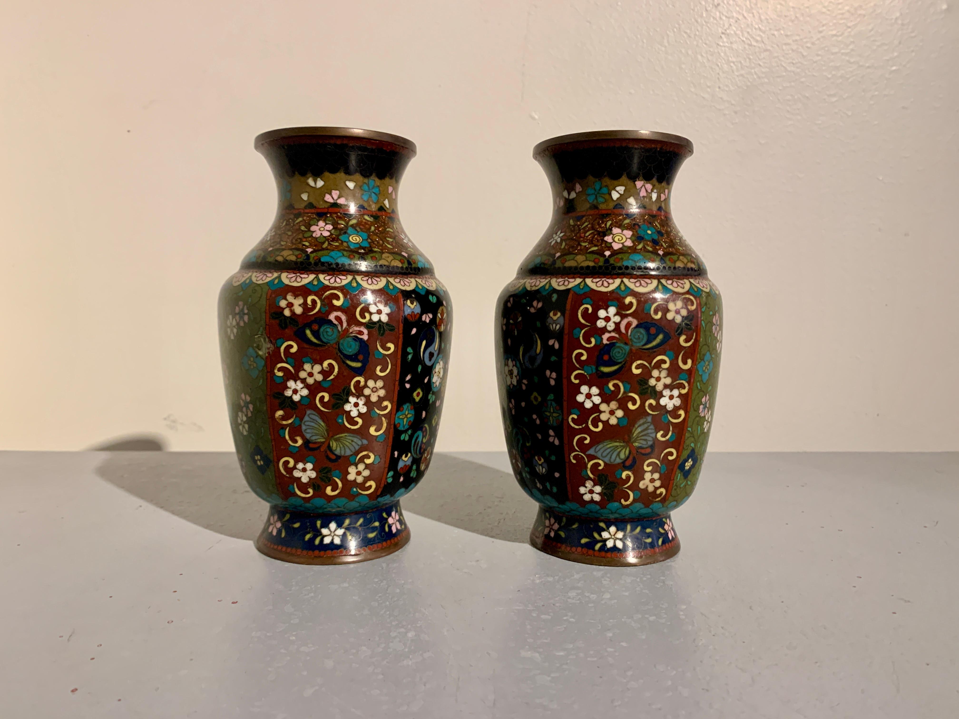 A delightful pair of Japanese cloisonne and goldstone faceted vases, Meiji period, late 19th century, Japan.

The vases each with a faceted body, tapered shoulders, short neck and everted mouth, all set on a slightly splayed foot. 

The faceted