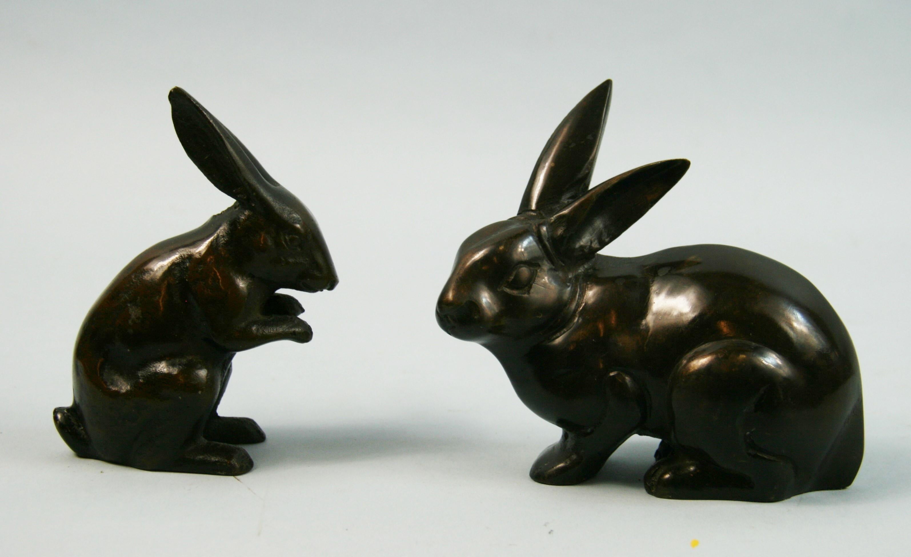 3-718 pair hand cast Japanese rabbits on is sold the other is hollow
Old Japanese label on bottom .
Measures: Tallest 5