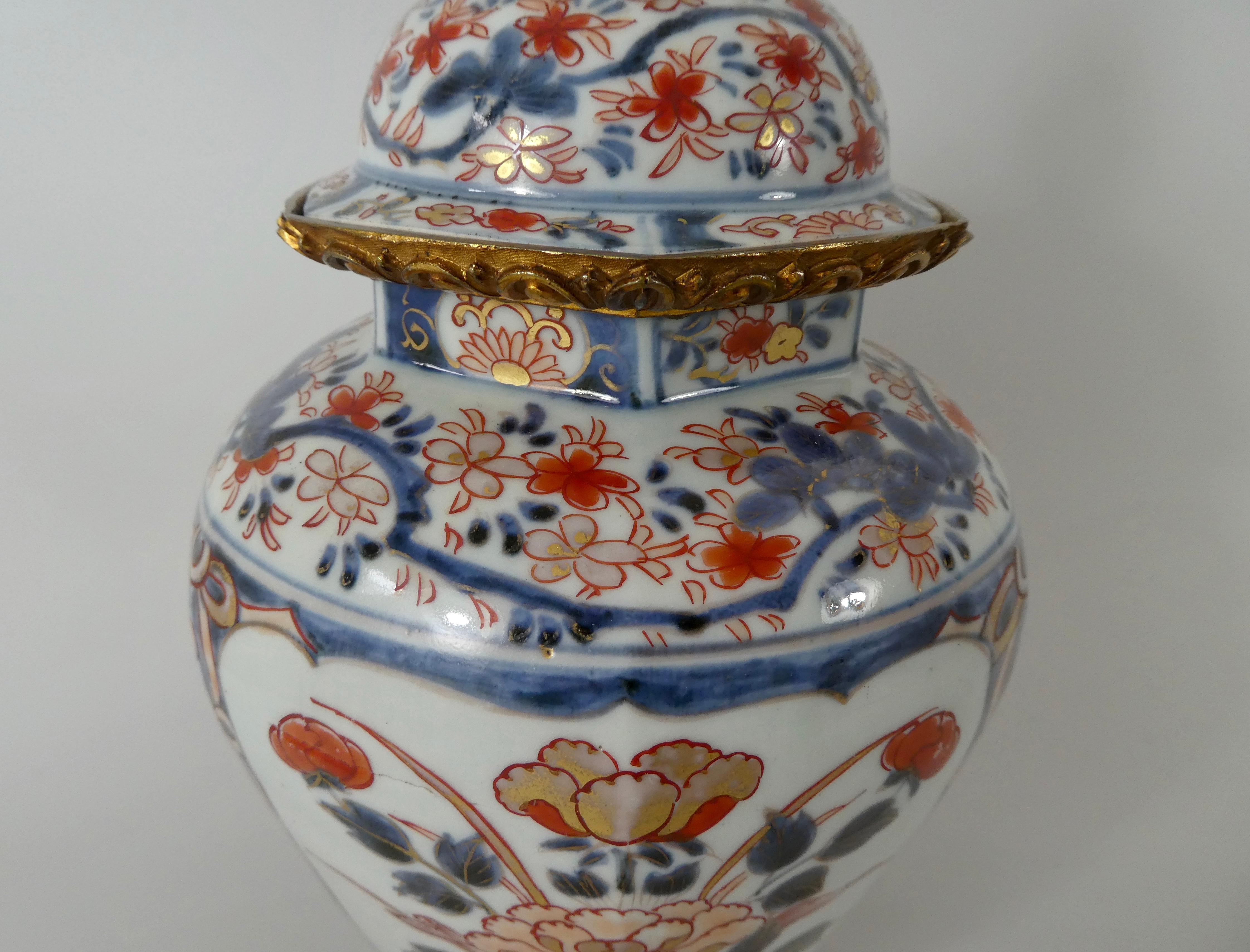 Fired Pair Japanese Imari porcelain vases and covers, c. 1690. Genroku Period.
