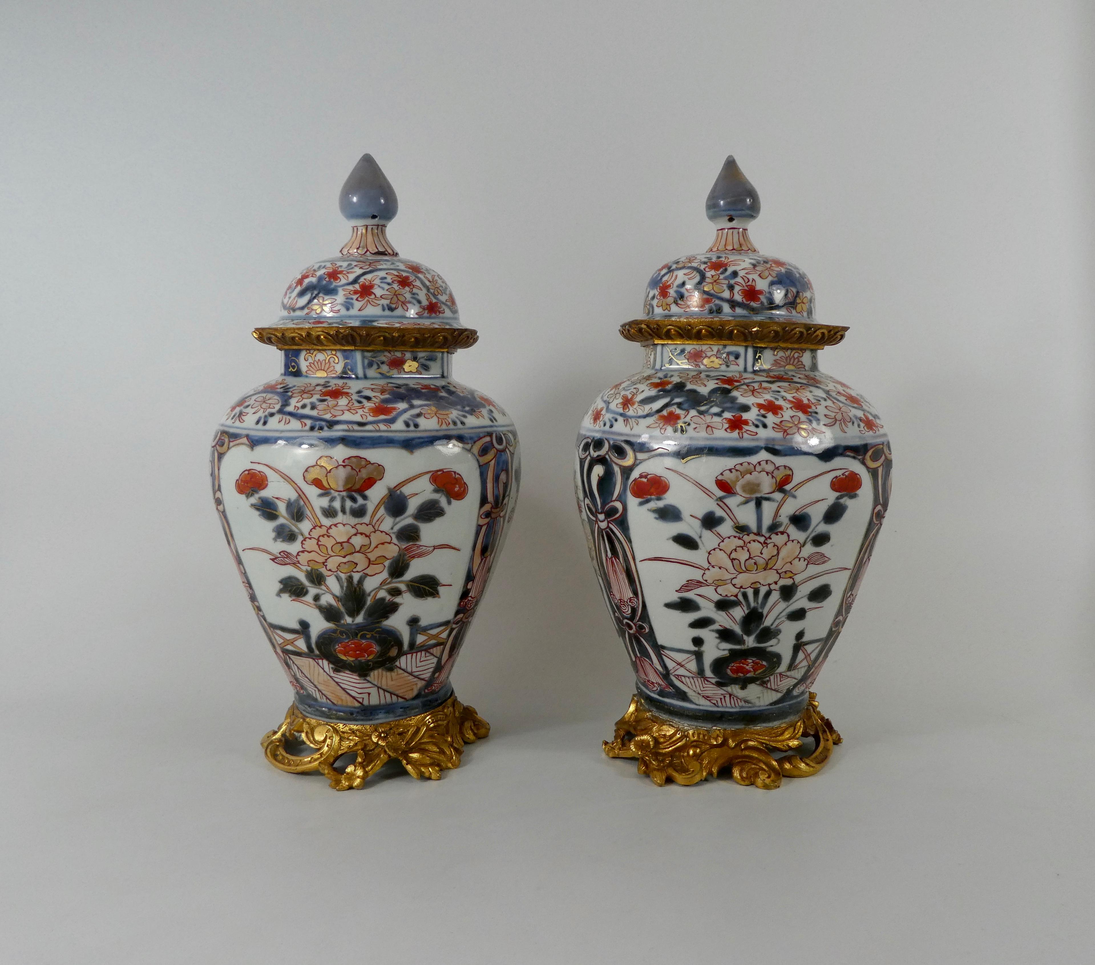 Pair Japanese Imari porcelain vases and covers, c. 1690. Genroku Period.