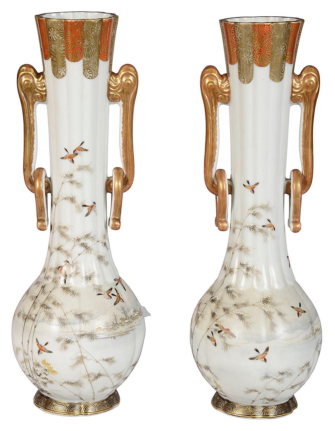 A fine quality pair of late 19th Century Japanese Kutani two handle vases / lamps. Each with wonderful hand painted scenes of Swifts flying through in air, with mountains and lakes in the background. Classical orange and gilt motifs to the neck and