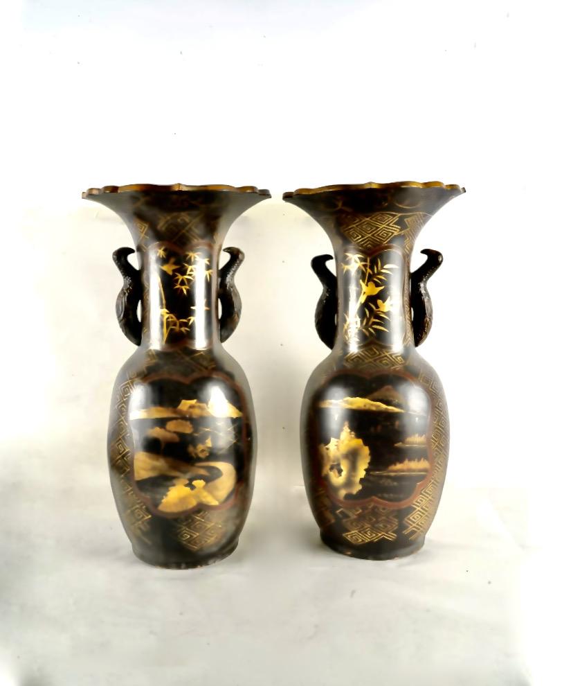 This is a good example of Meiji period lacquer-on-porcelain large statement vases. The maki-e lacquer decoration features birds to one of the sides and landscapes on the opposite sides, in addition to 