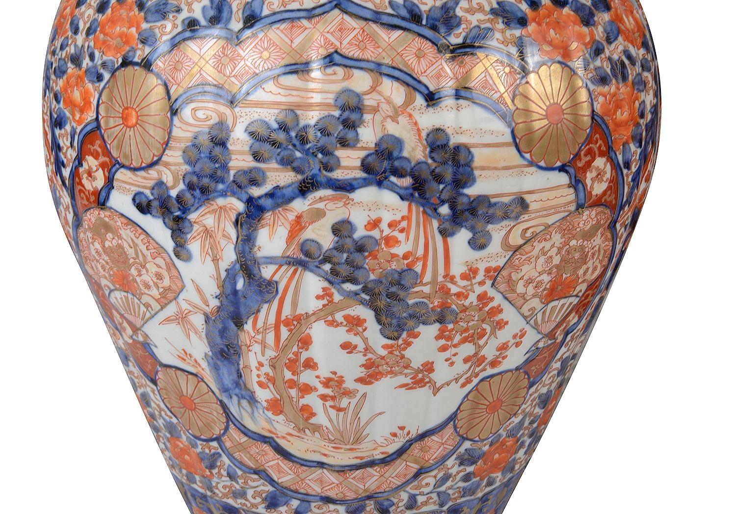Hand-Painted Pair Japanese lidded Imari vases, 19th Century For Sale