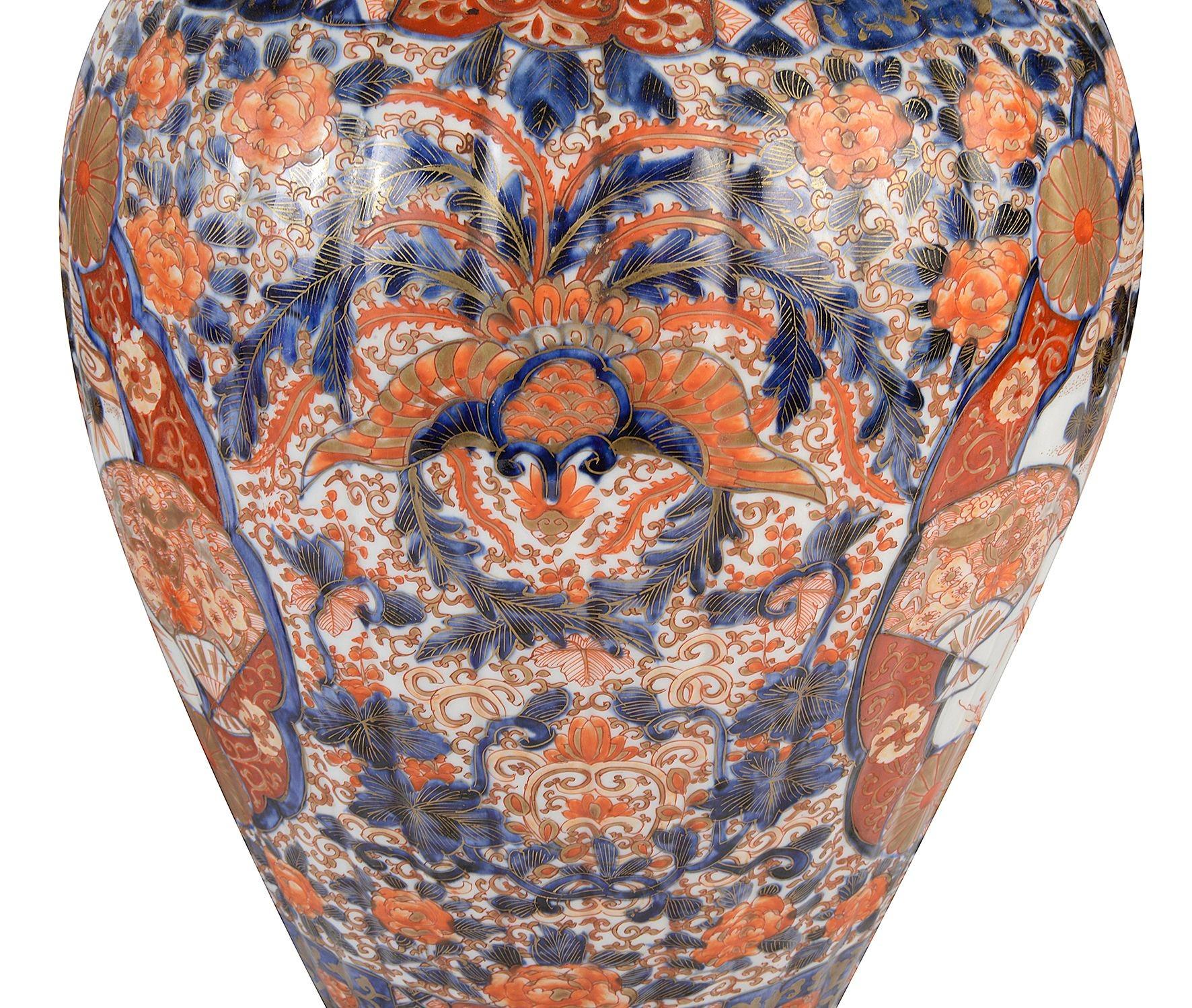 Porcelain Pair Japanese lidded Imari vases, 19th Century For Sale