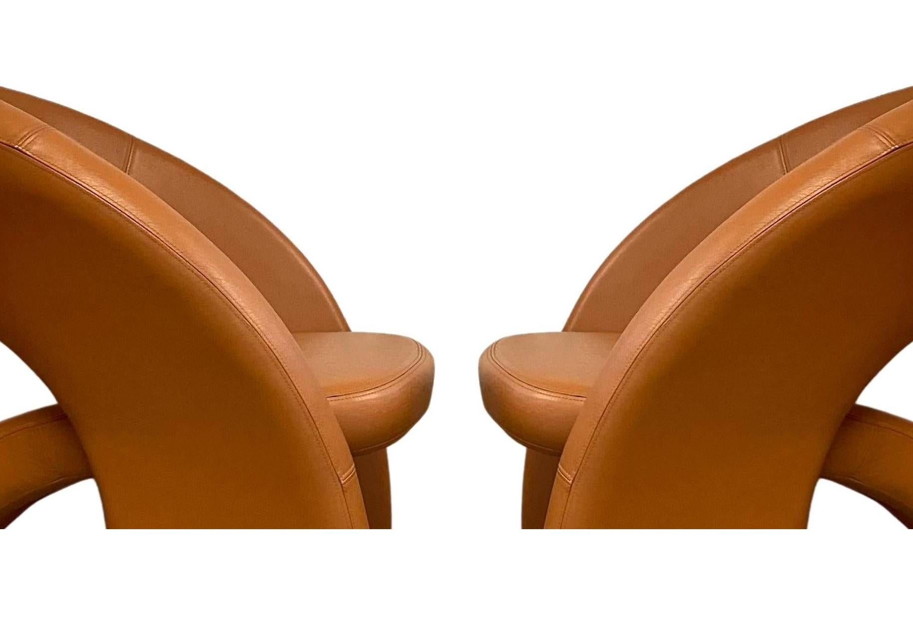 Stunning post modern Jaymar chairs for those who seek the extraordinary. Sculptural and confident, these remarkable chairs are functional modern art. It features a dynamic design with three leg construction, sweeping curves forming organic contours