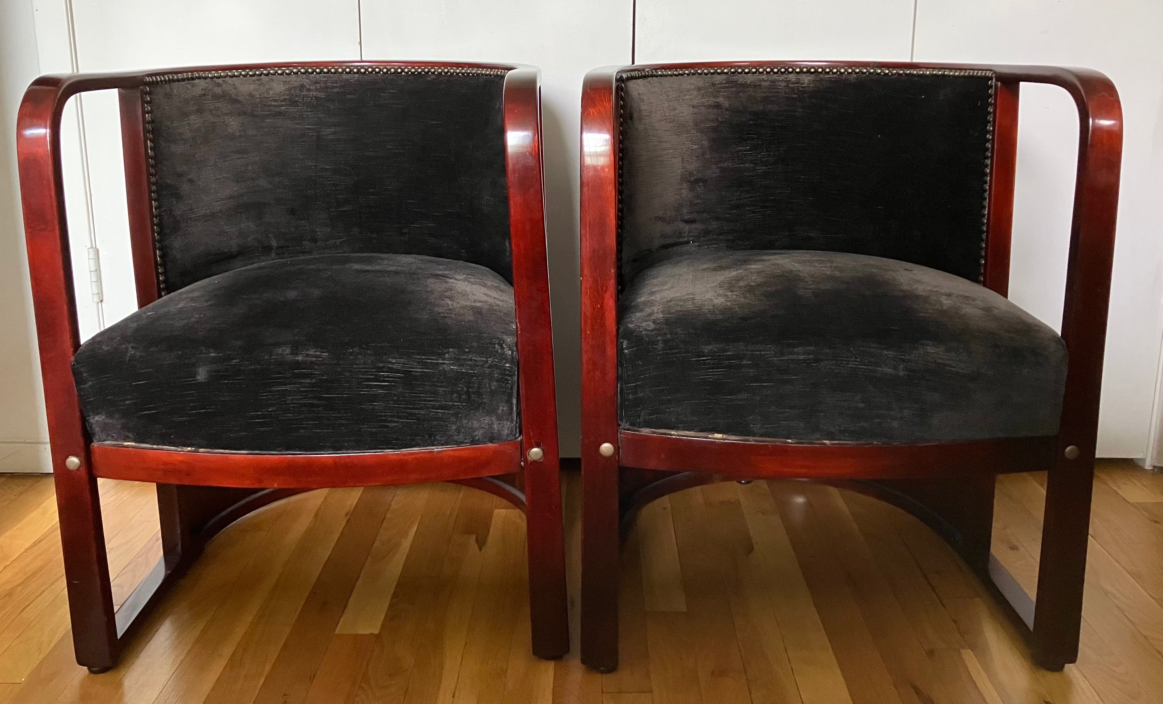 Beautiful pair signature Barrel Chairs by Josef Hoffmann for J&J Kohn. Bentwood construction provides ample yet elegant seat. Barrel back has wonderfully figured veneer work, with brass caps.