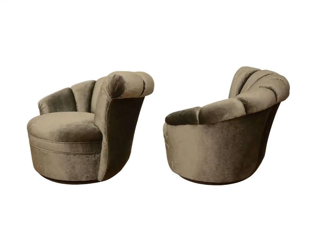 Mid-20th Century Pair Kagan Style Channel Back Nautilus Swivel Chairs For Sale