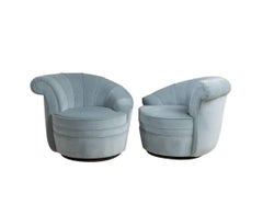 Pair of Soft Blue Channel Back Swivel Chairs