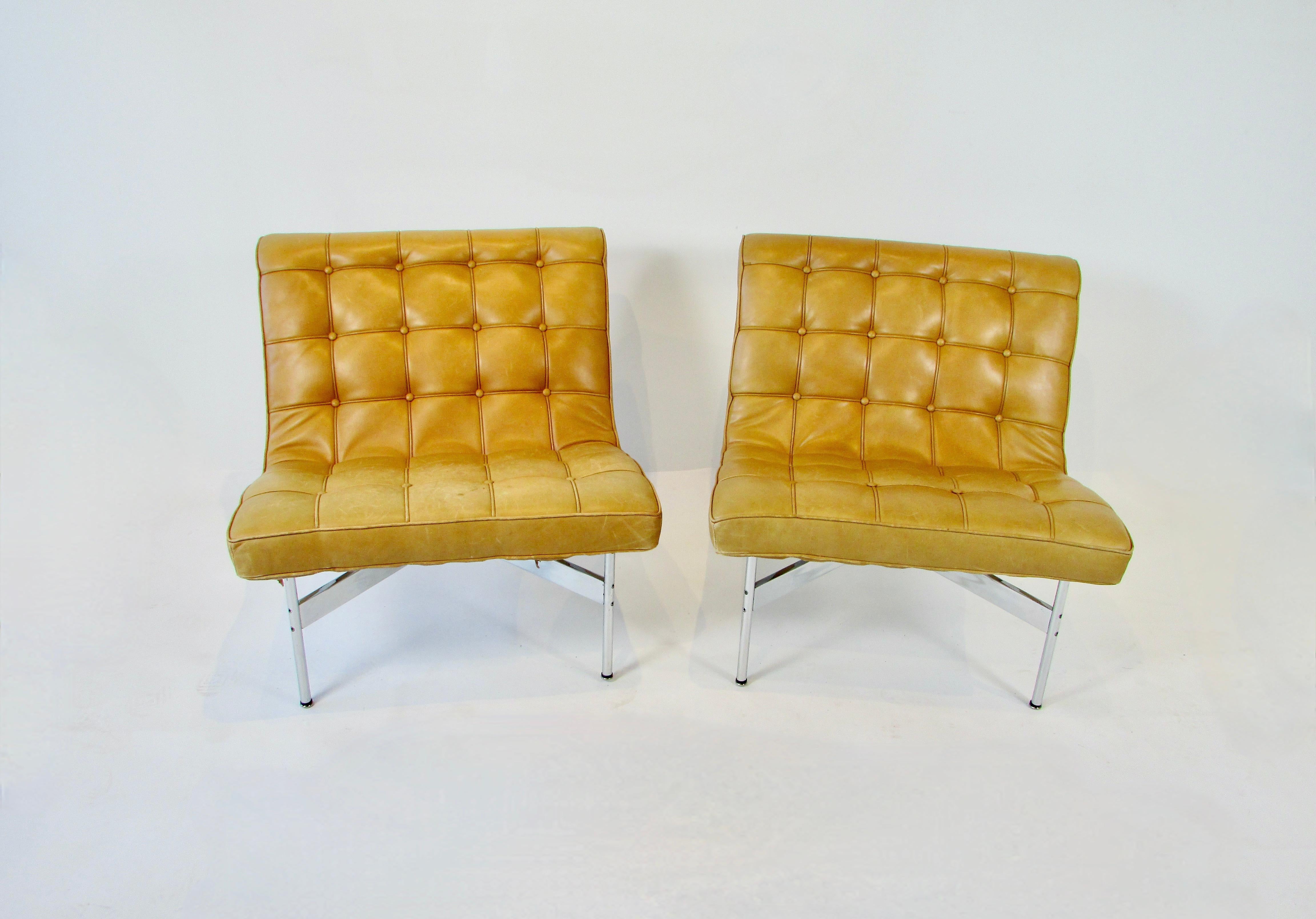Classic pair of original lounge chairs designed by William Katavolos, Ross Littell and Douglas Kelley for Laverne International from the Architectural Group One line of 1952.  Architectural in design , the steel frame creates an open  floating